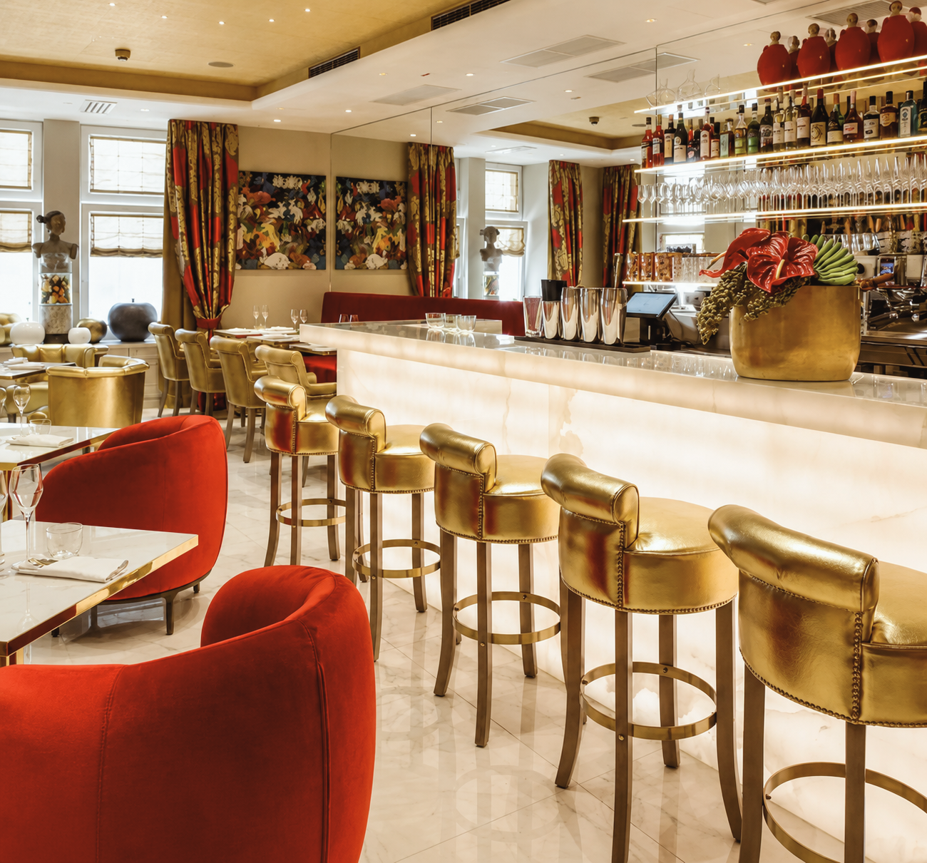 Gold and red bar interior at Hotel Das Tyrol boutique hotel in Vienna