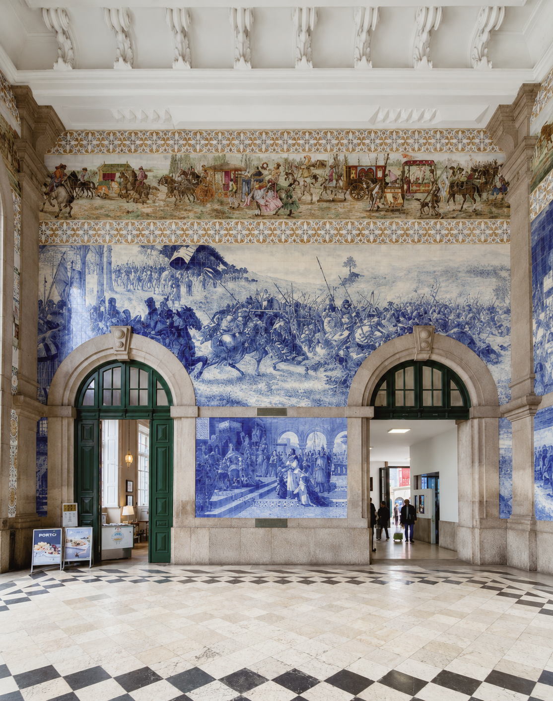 São Bento Railway Station in Porto, Portugal, featuring its famous blue-and-white azulejo tile murals depicting scenes from Portuguese history.