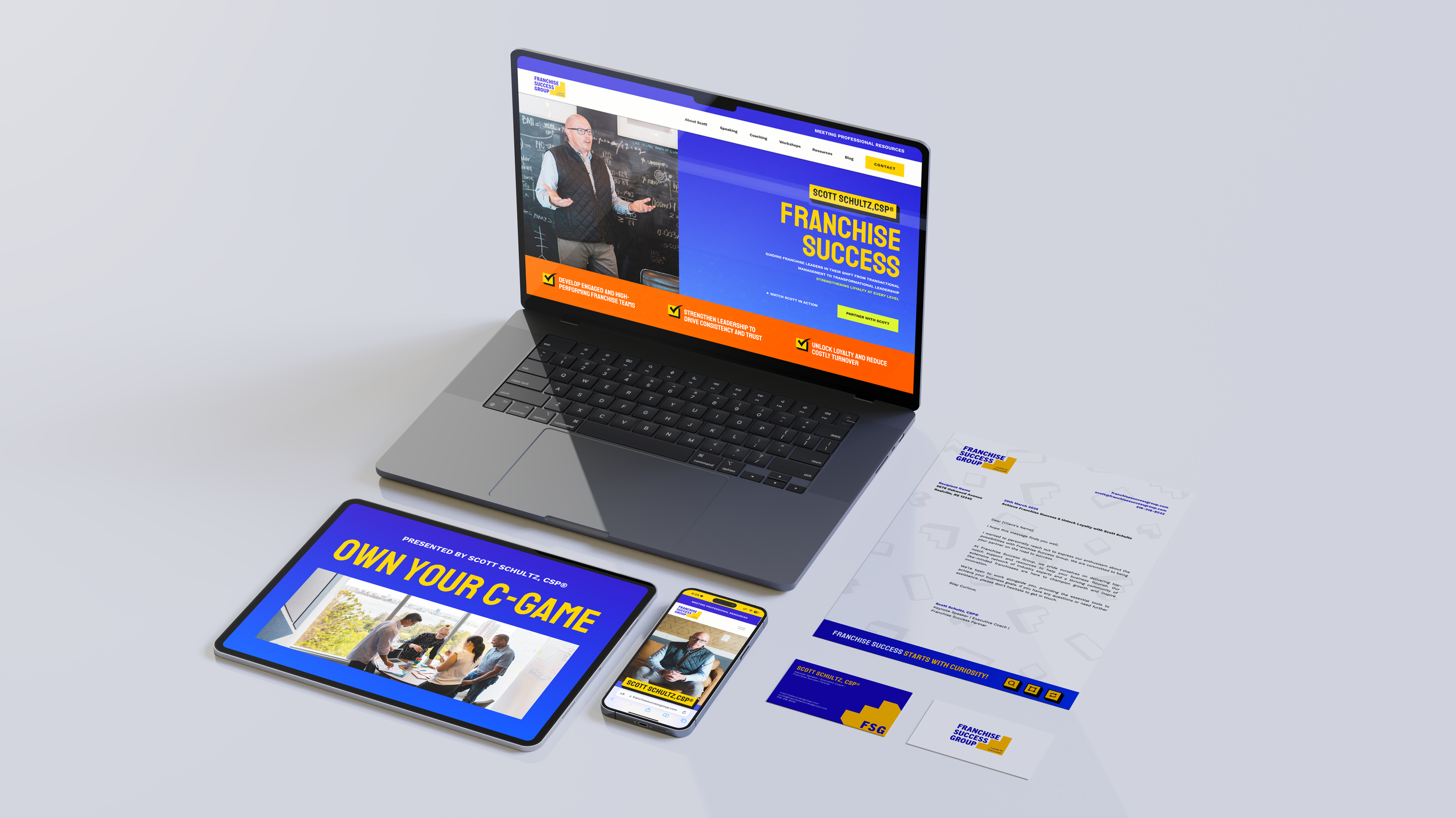 Laptop, tablet, and smartphone displaying website and branding materials for Franchise Success. The laptop screen shows a webpage with the text 'FRANCHISE SUCCESS' and an image of a man in a classroom. The tablet displays a webpage titled 'OWN YOUR C