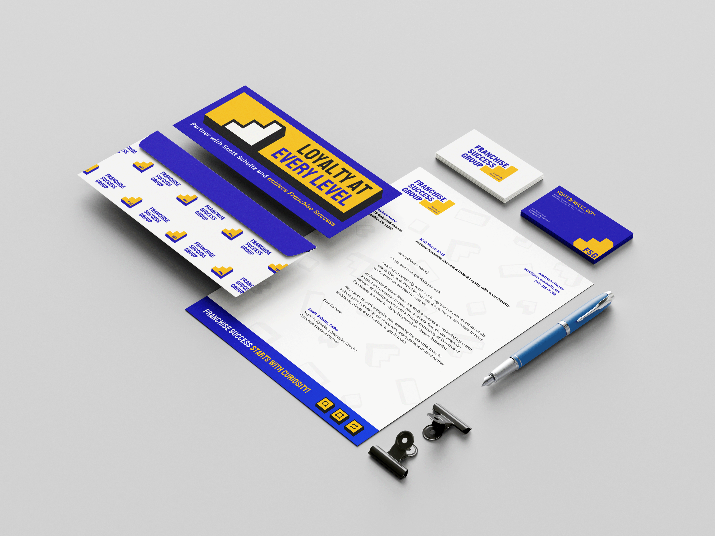 Branded stationery set including a brochure with a yellow and blue design, business cards, sticky notes, a letter, and a pen, all with franchise success branding and slogan.