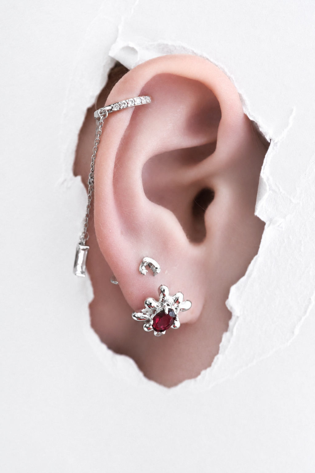 silver-ear-stack-crystal-huggie-and-ruby-flower-earring.png
