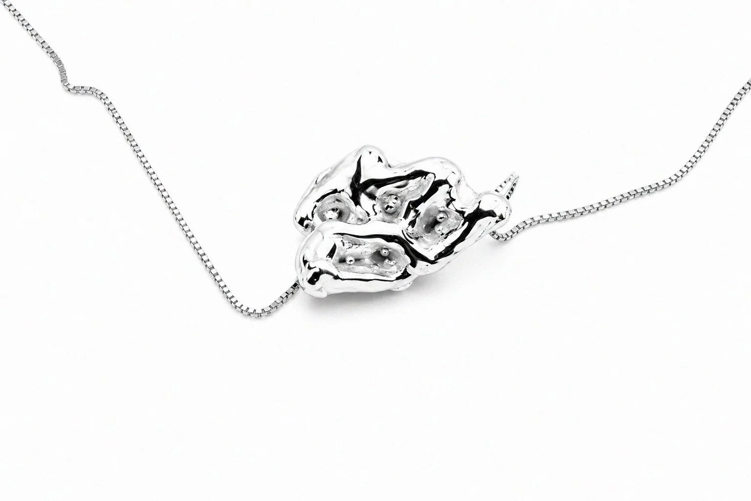 sterling-silver-abstract-sculptural-pendant-necklace-side-view.png