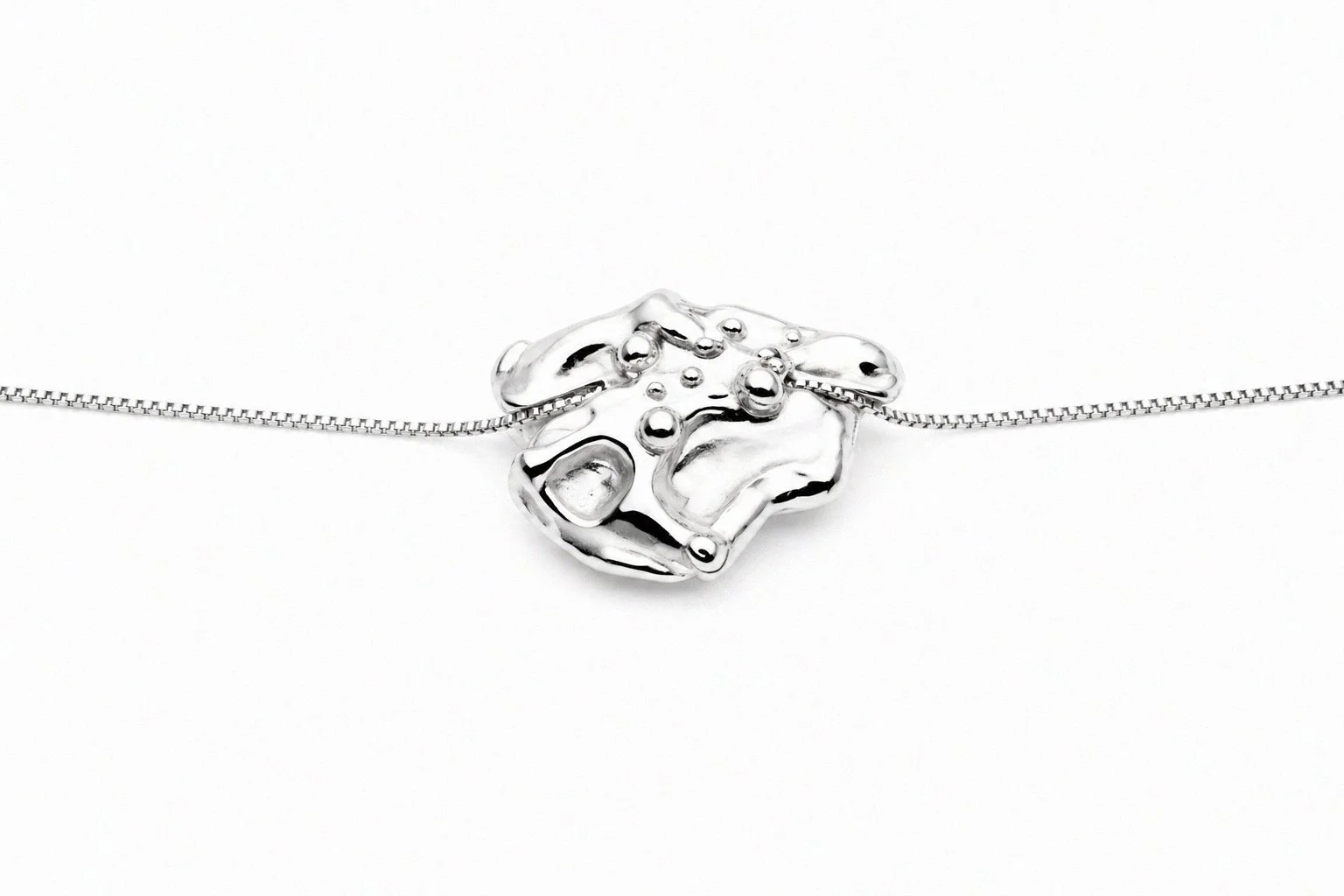 sterling-silver-abstract-sculptural-pendant-necklace-front-view.png
