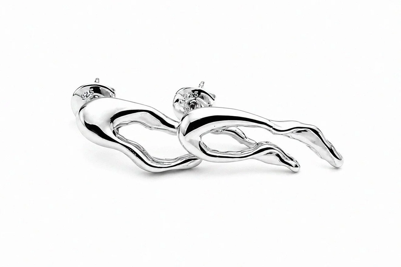 sterling-silver-925-organic-elongated-wave-stud-earrings-angled-view.png
