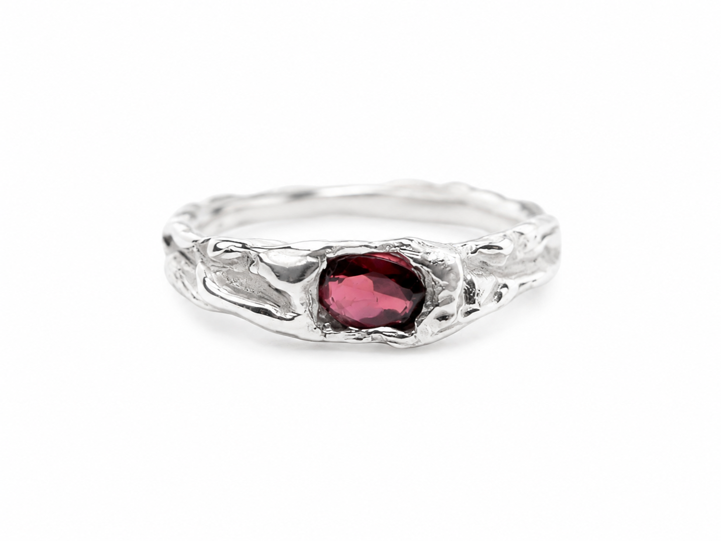 silver-garnet-oval-ring-textured-band-front-view.png