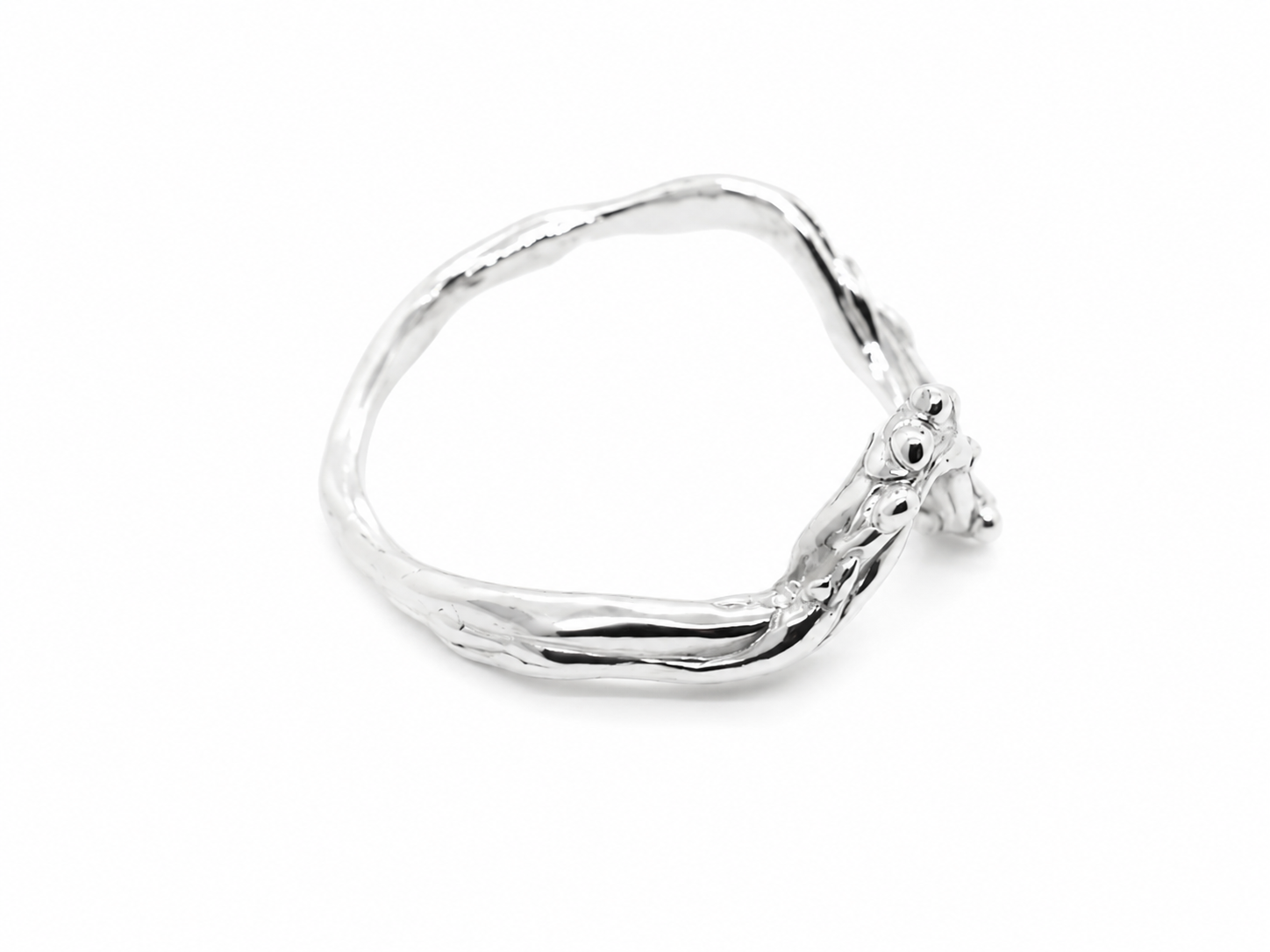 silver-textured-cluster-ring-angled-view.png