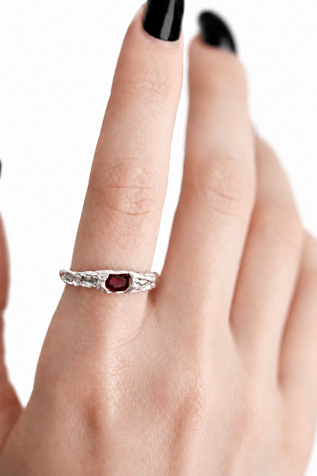 silver-ring-with-red-garnet-stone.png