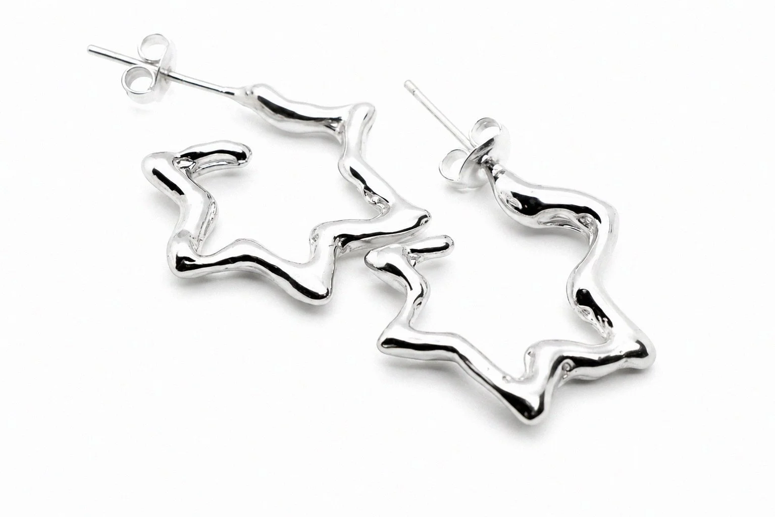 sterling-silver-organic-open-star-outline-stud-earrings-angled-view-pair.png