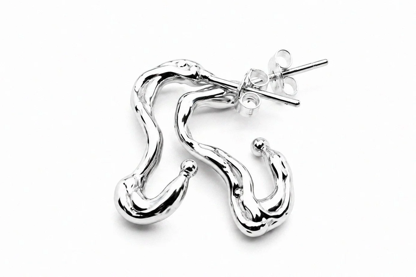 sterling-silver-organic-s-curve-wave-sculptural-stud-earrings-angled-view.png