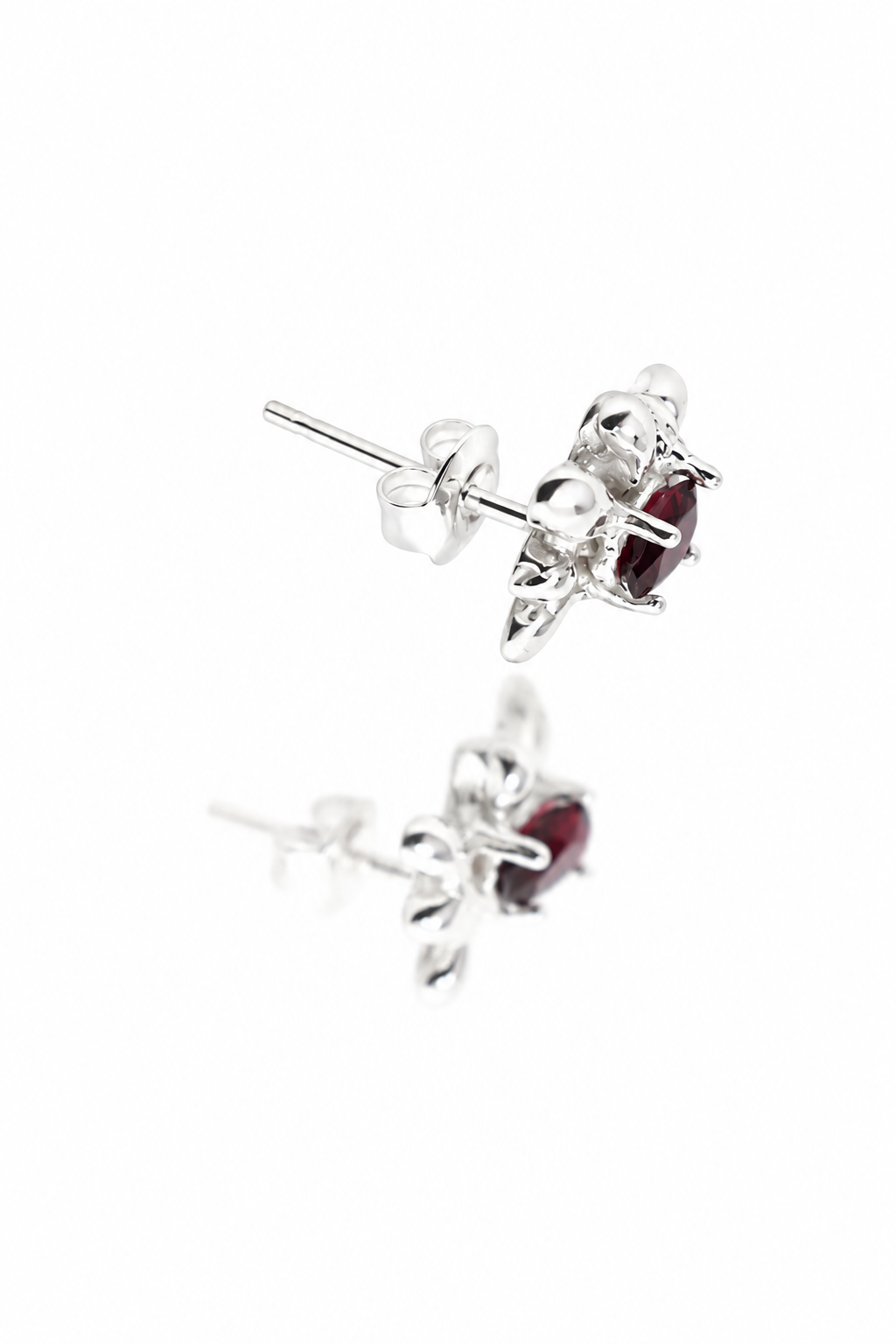 silver-garnet-stud-earrings-pair.png