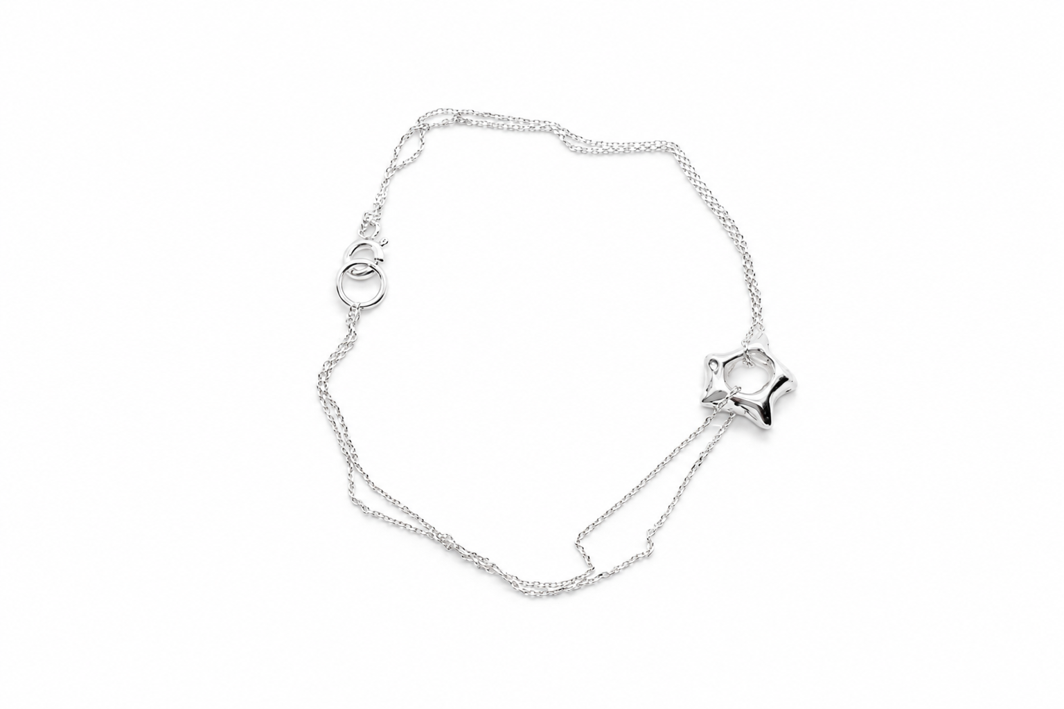 silver-star-charm-bracelet-flat-lay.png