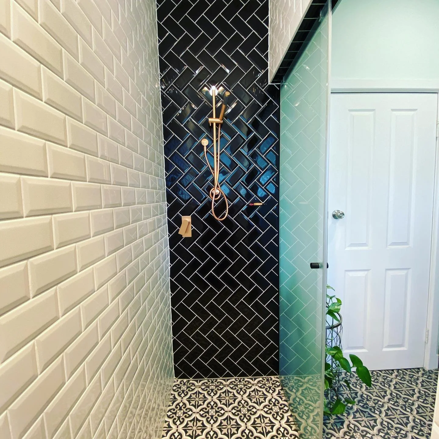 black-herringbone-feature-wall-bathroom.jpeg