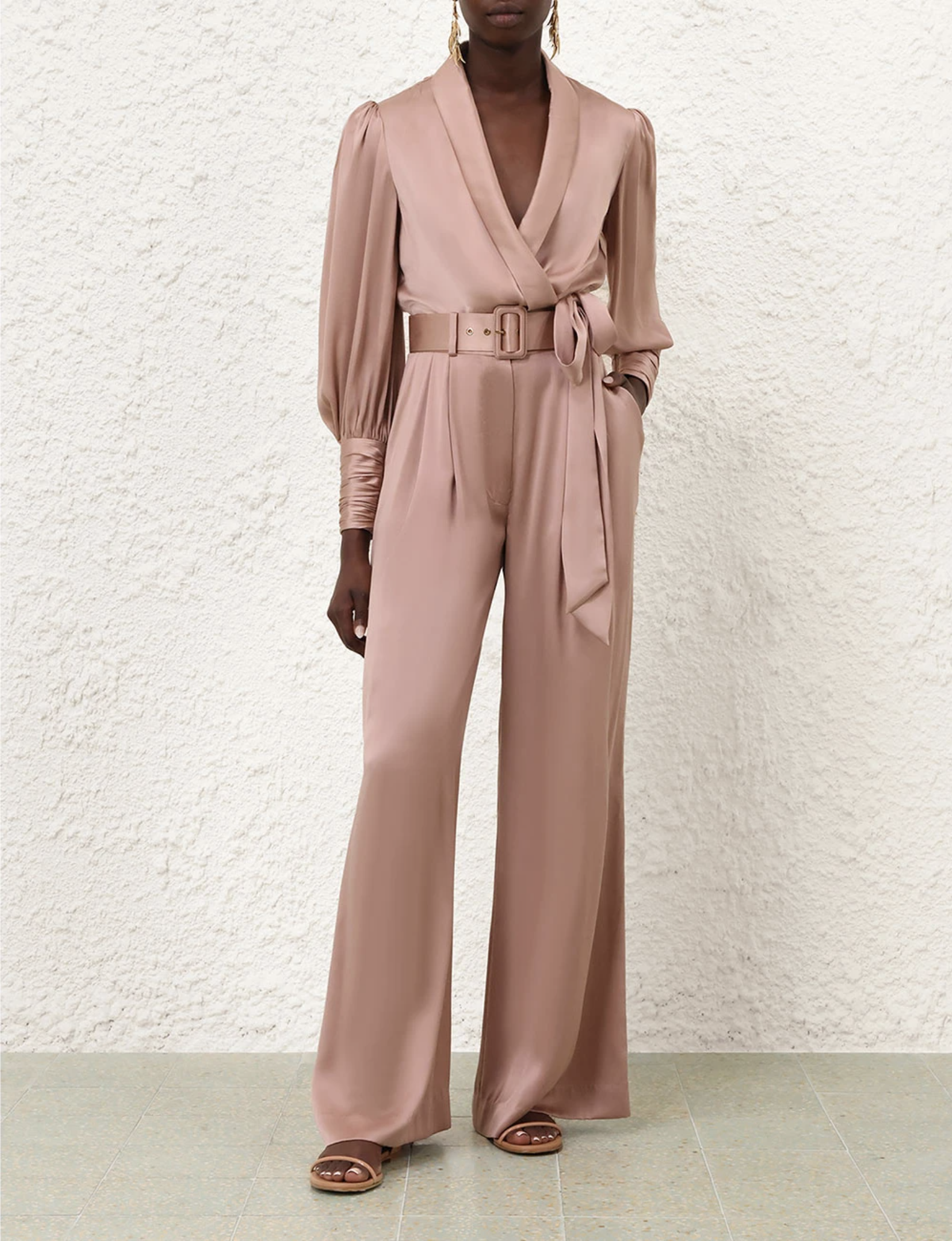 Woman in pink jumpsuit