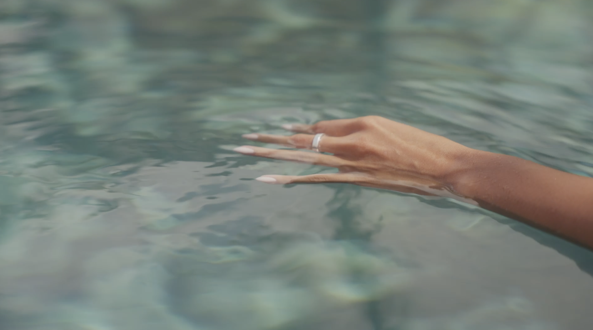 Hand in pool.png