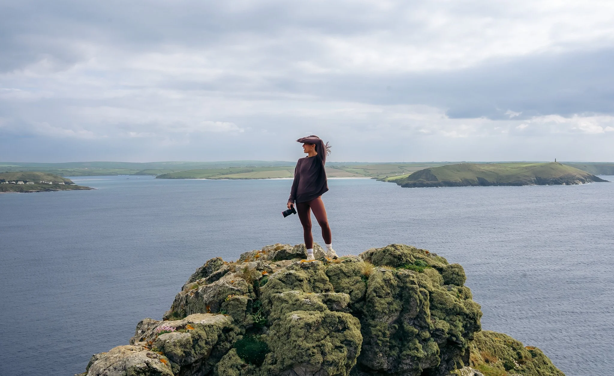 Freelance brand videographer and filmmaker Ellinor on the Cornish coast
