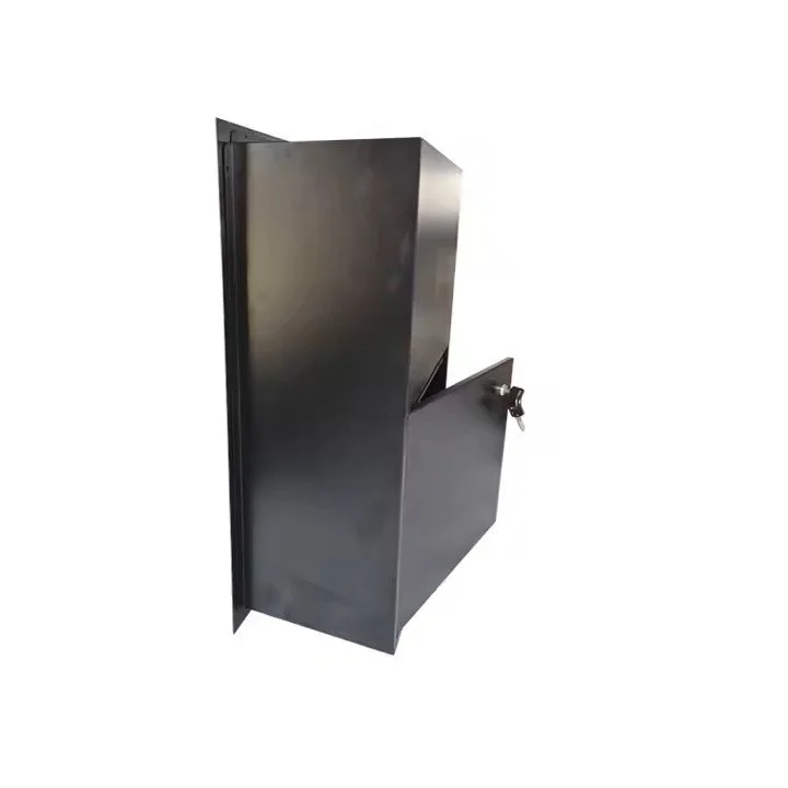 Stainless steel safe with a lock, installed in a wall.