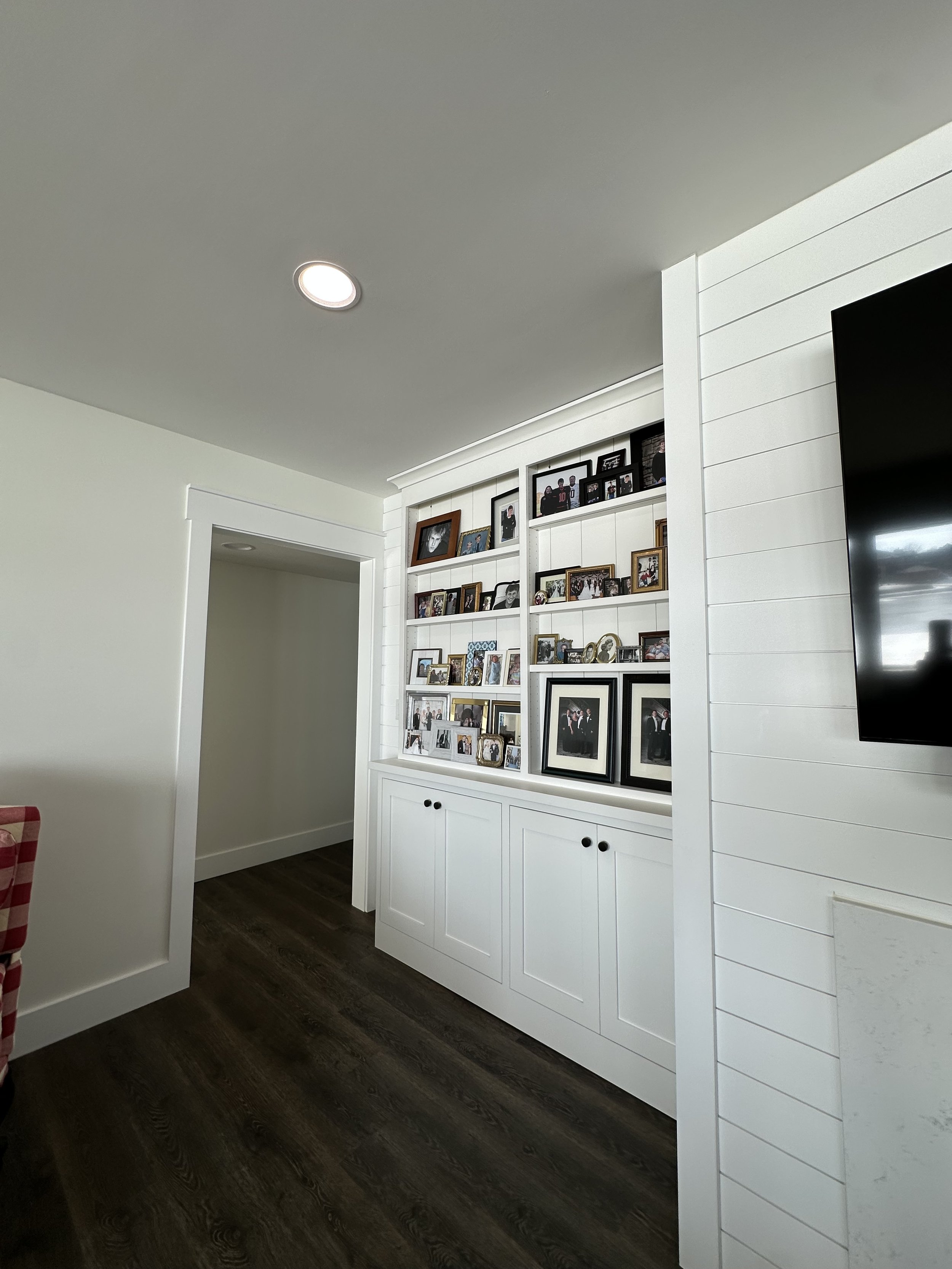 Rather than the long dark hallway, we added an entry into the original guestroom and then new bathroom and bunkroom we created.