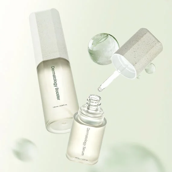 Anti-aging skincare products including a serum bottle, a dropper, and two bottles labeled 'Dermalogy Booster' and 'Dermalogy Serum' with a minimalist background.