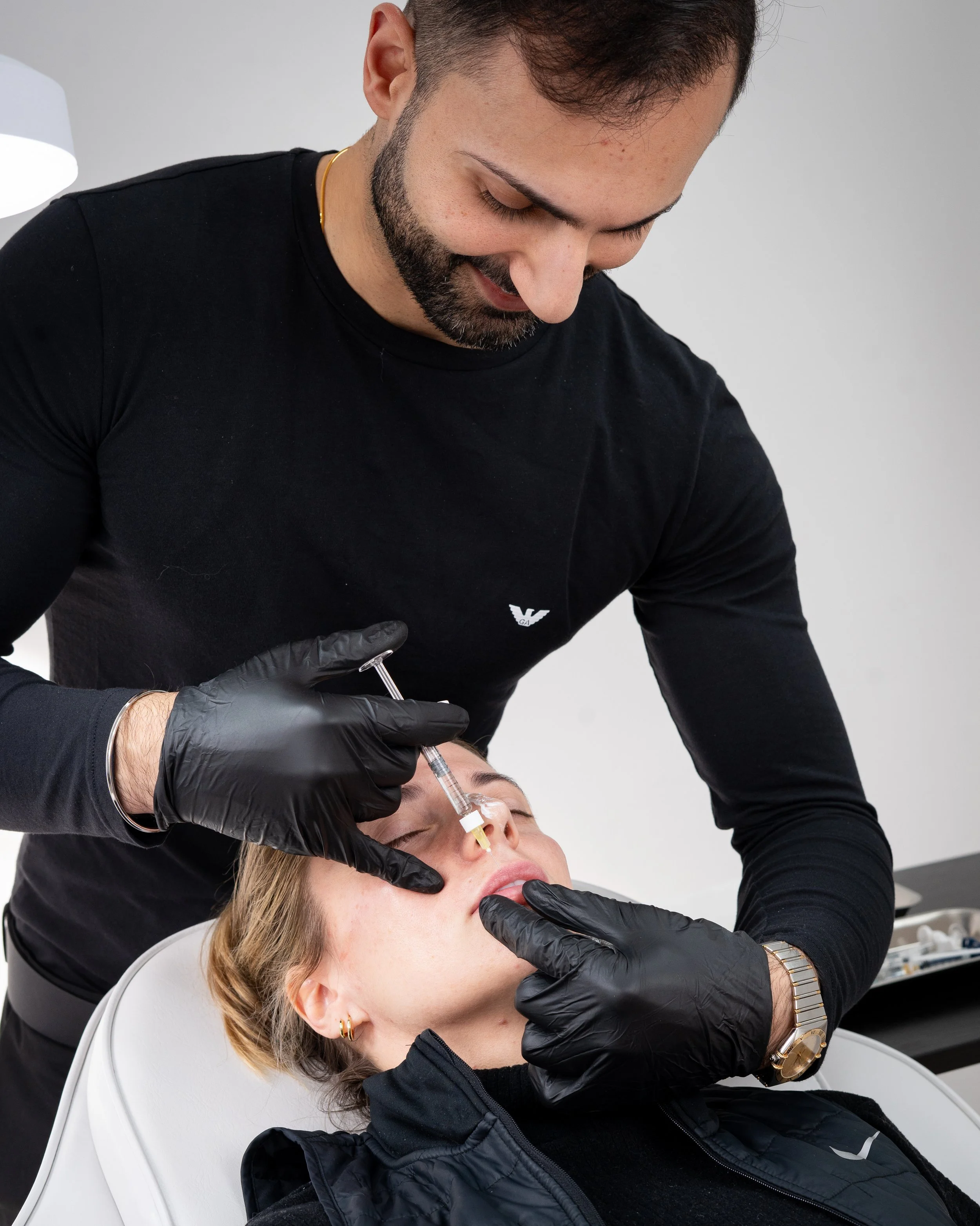 A woman having the best Lip Filler treatment in London Harley Street, from the best Cosmetic Doctor, Dr. Armani
