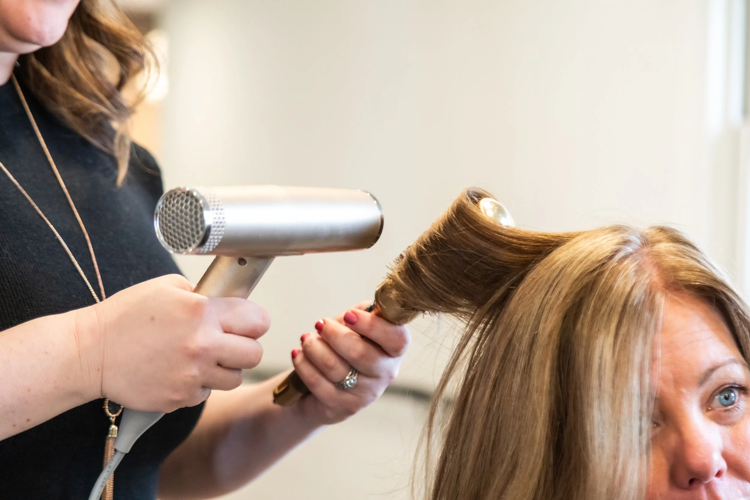 Hair styling and blowout service at Art & Alchemy Hair Lounge in Newtown Square, PA