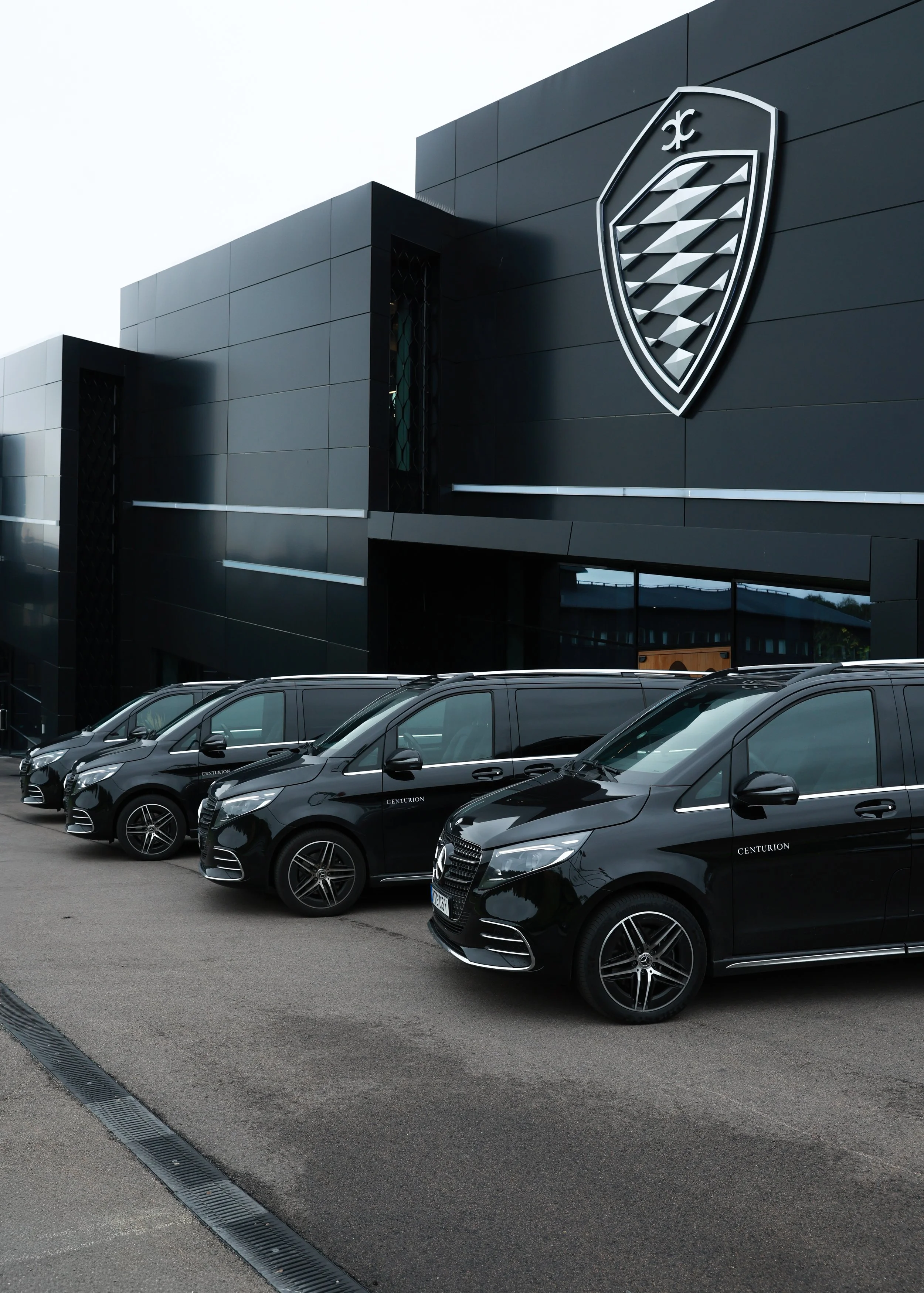 Raaf & Co Chauffeur service Mercedes-Benz V-Class vehicles parked outside Koenigsegg Atelier in Ängelholm, Sweden