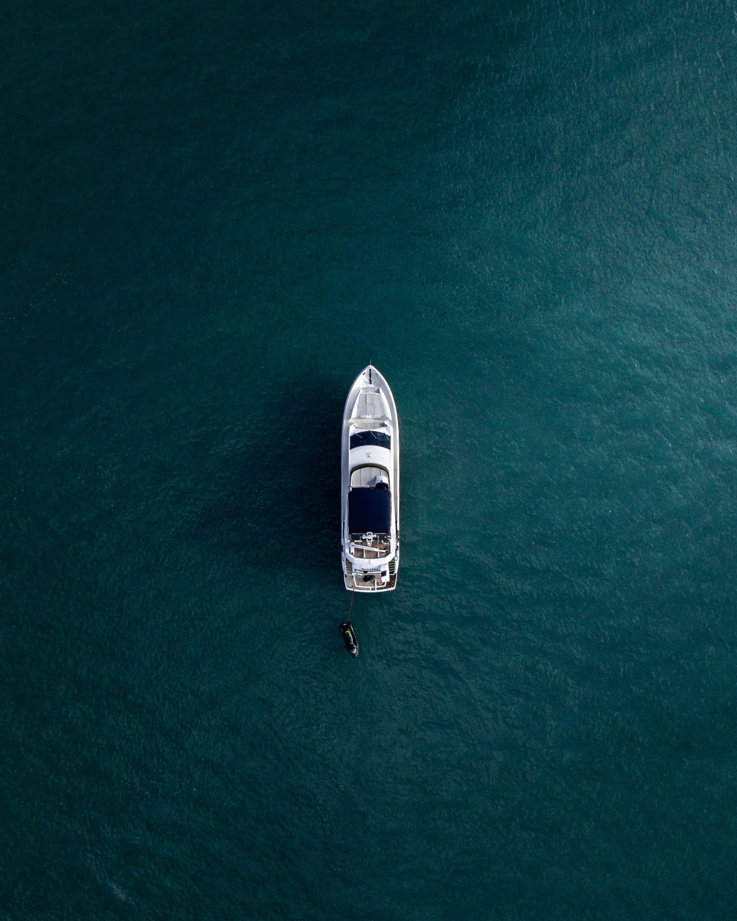 A yacht cruising off the coast of northwestern Skåne, symbolizing Raaf & Co’s connection to premium lifestyle and seamless sea-to-shore transfers.
