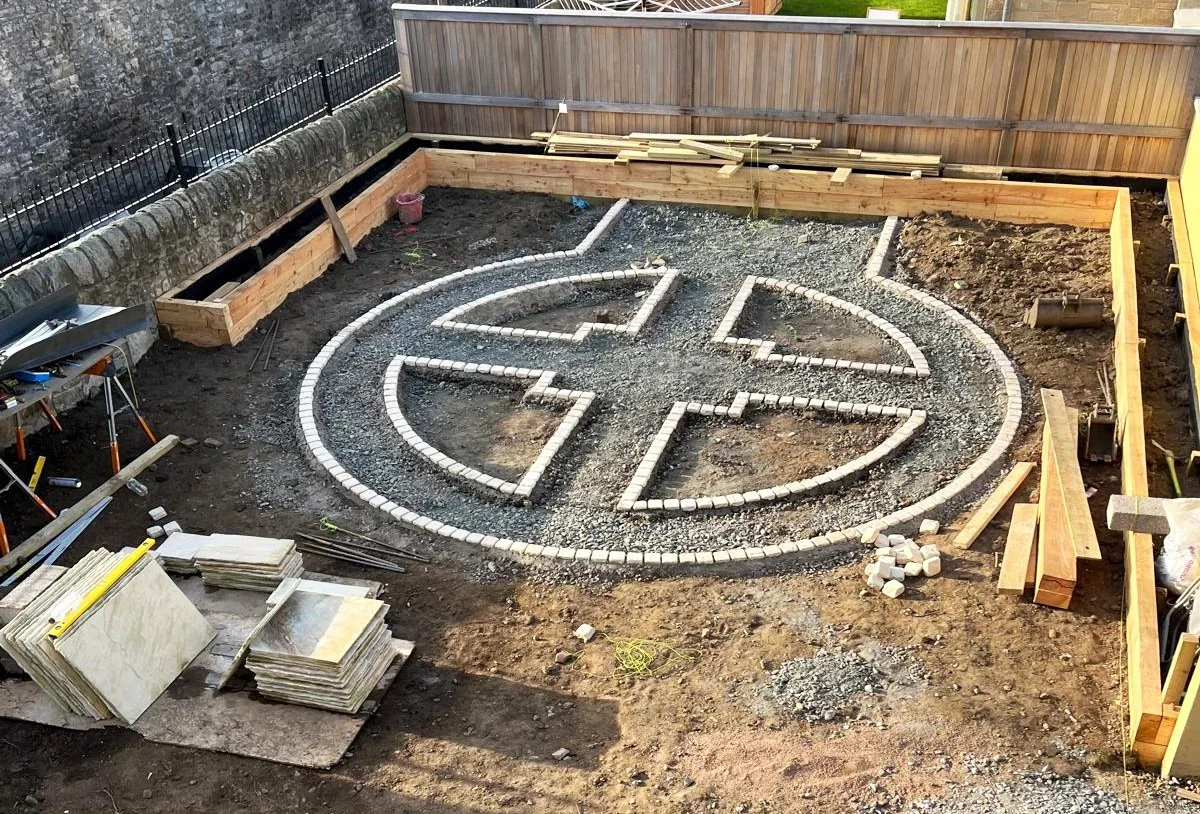 Birds eye view of a circular Potager garden being built.