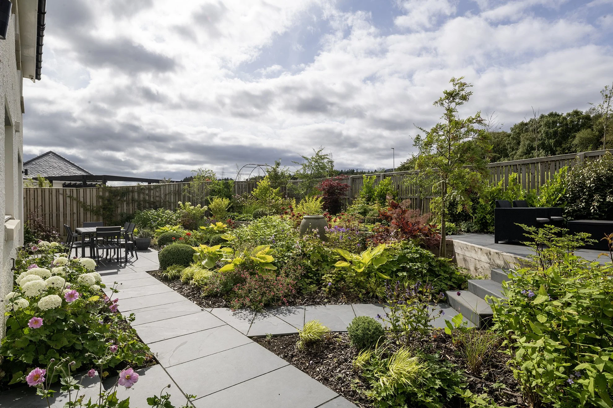 A beautifully laid out garden with gorgeous planting