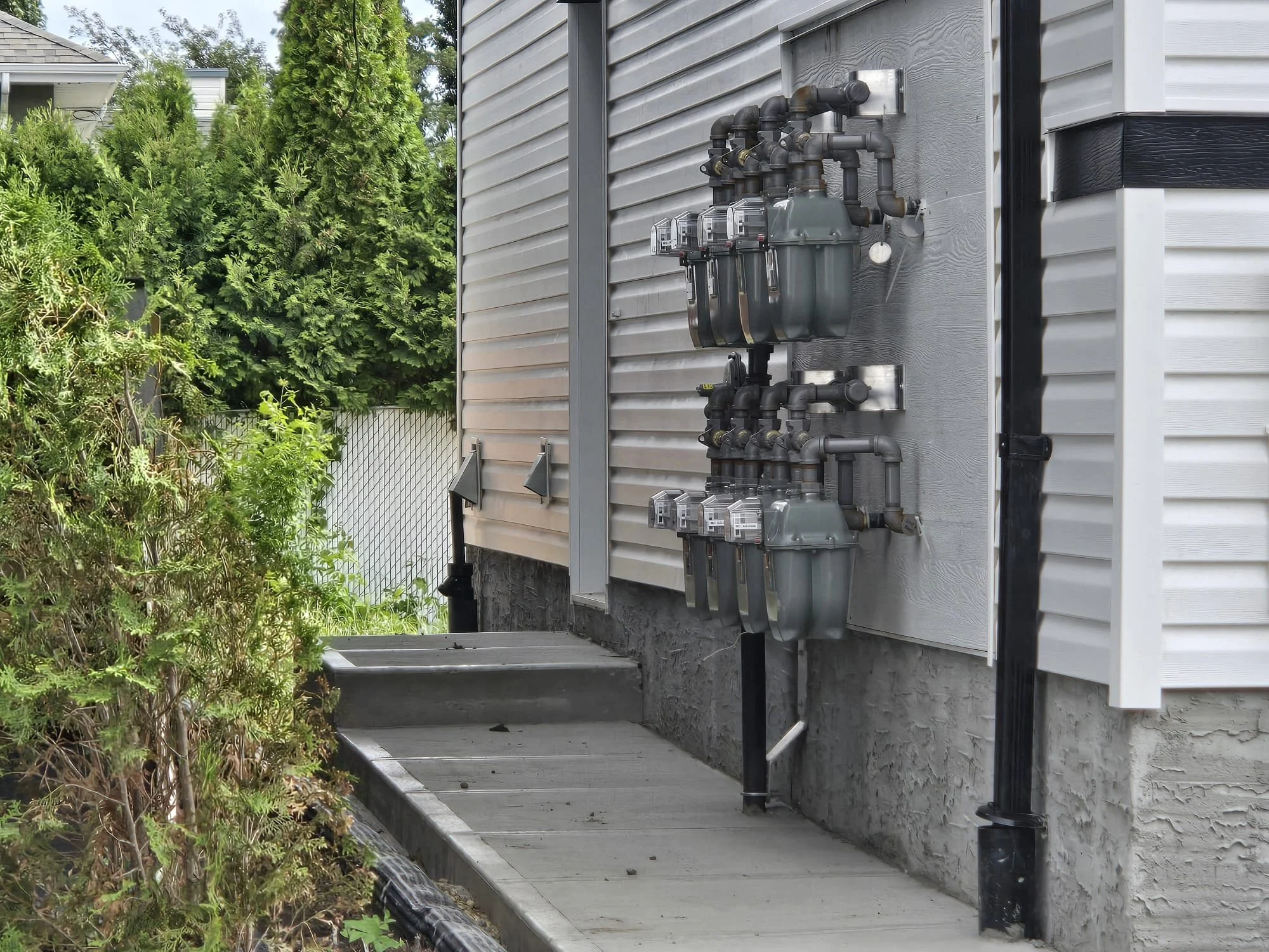 15209 99 ave meters on sidewalk.jpg