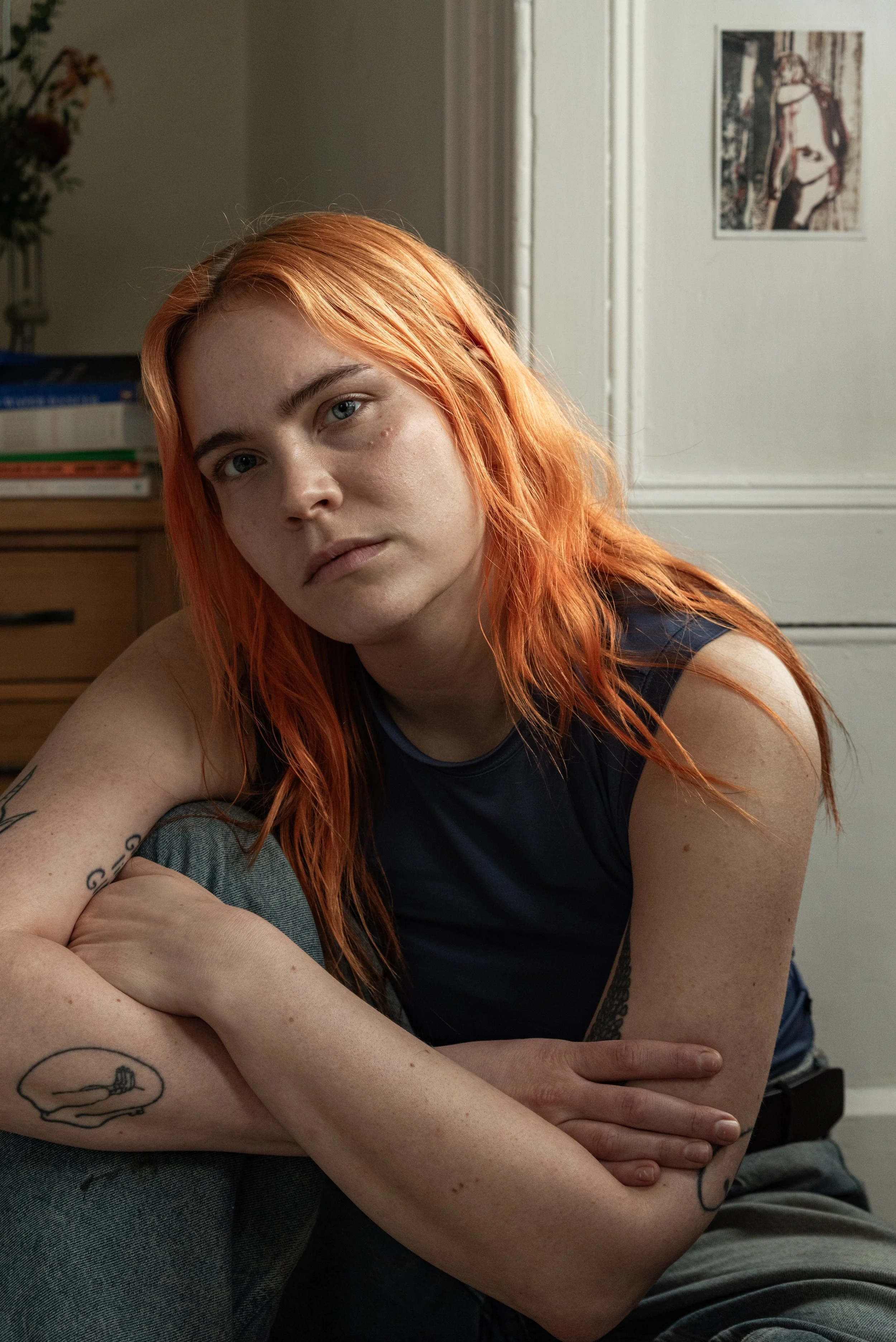 Portrait of girl in her room by window.