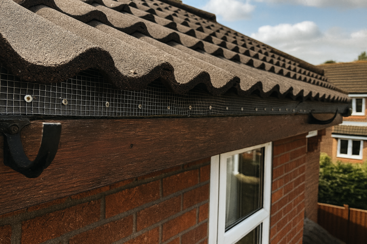 Squirrel proofing mesh installed along roof eaves to block loft entry at an Essex home by Beeyond Pest Control.