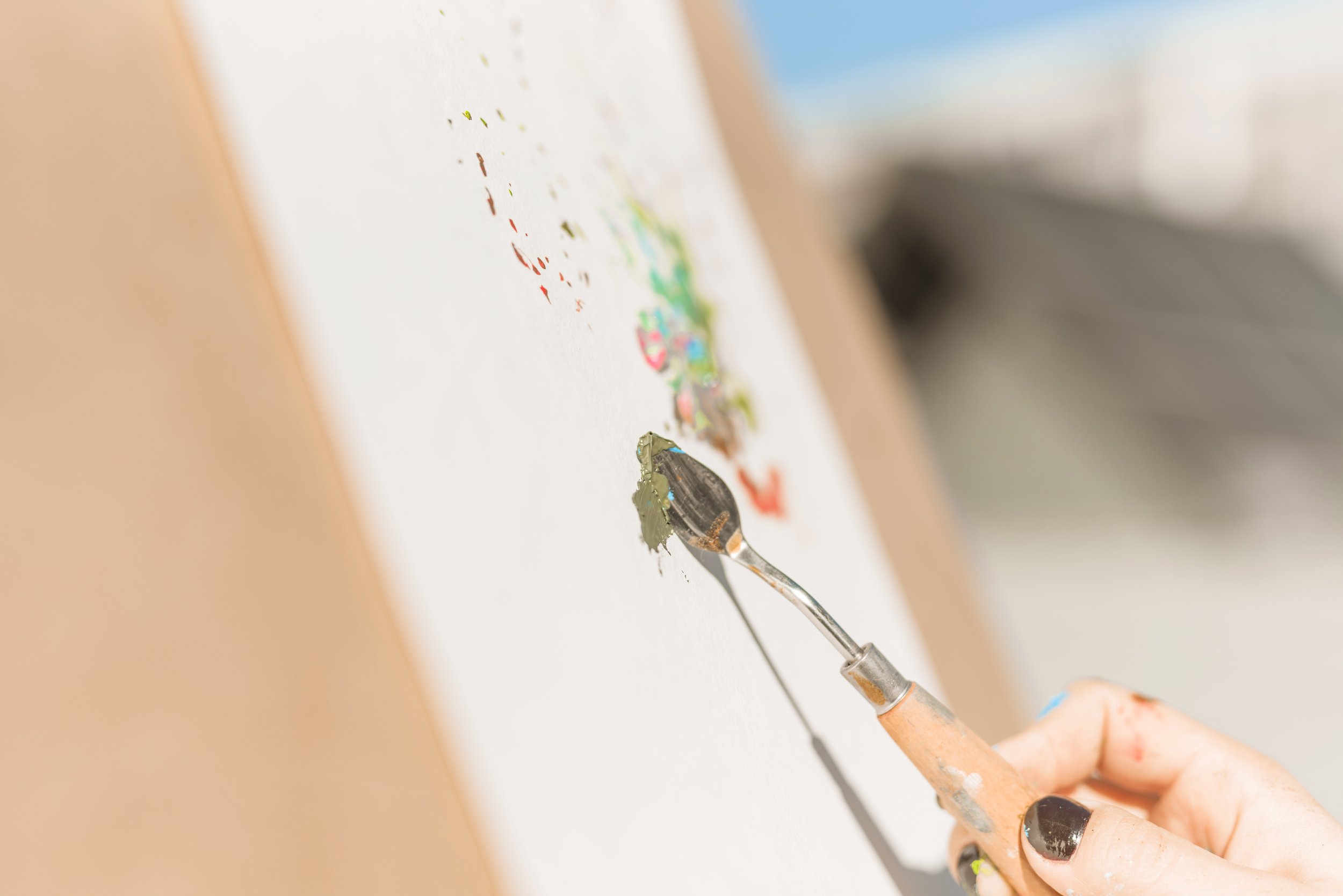 close-up-woman-painting-outdoors.jpg