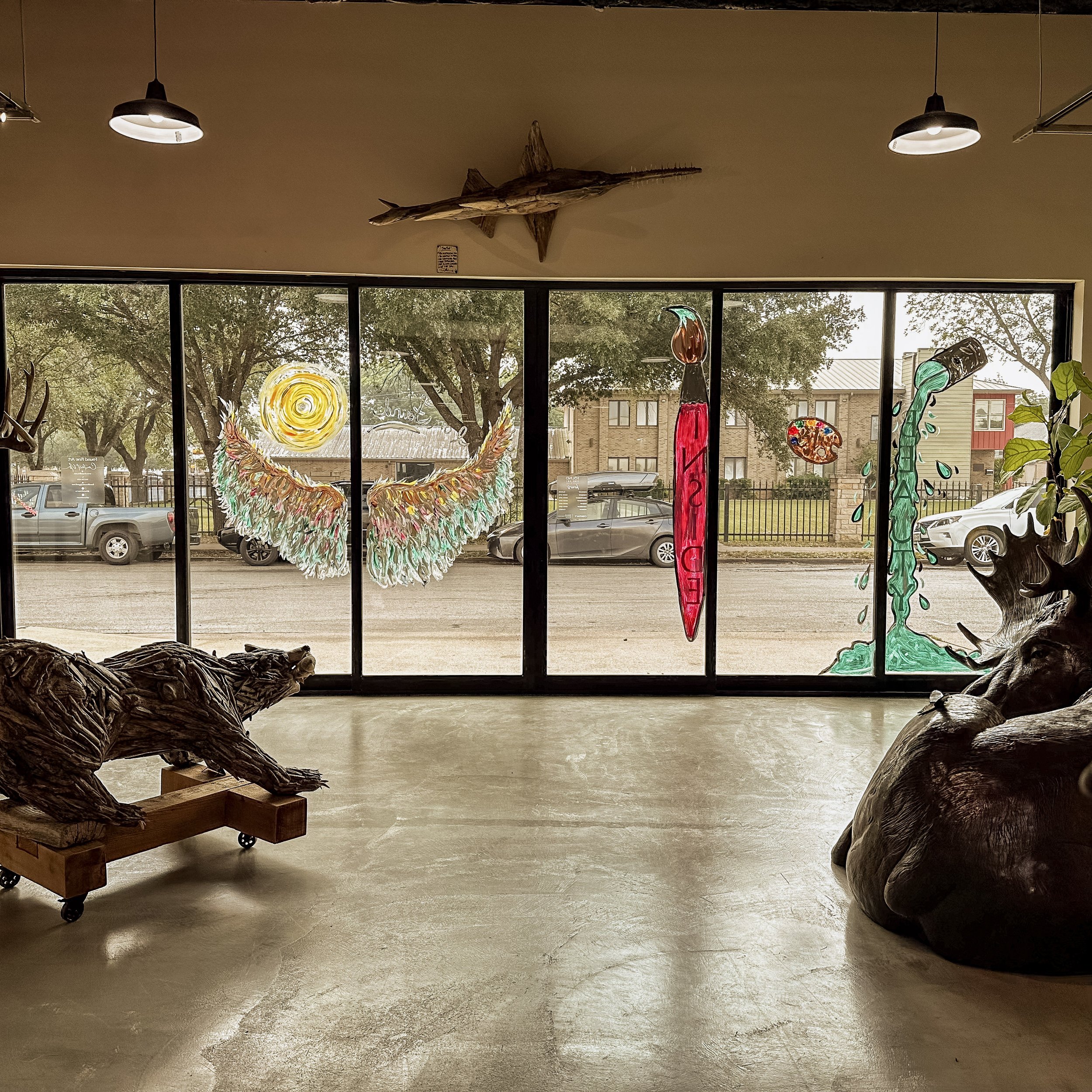 A wall of natural light pours into the space creating the perfect environment for the showroom floor.