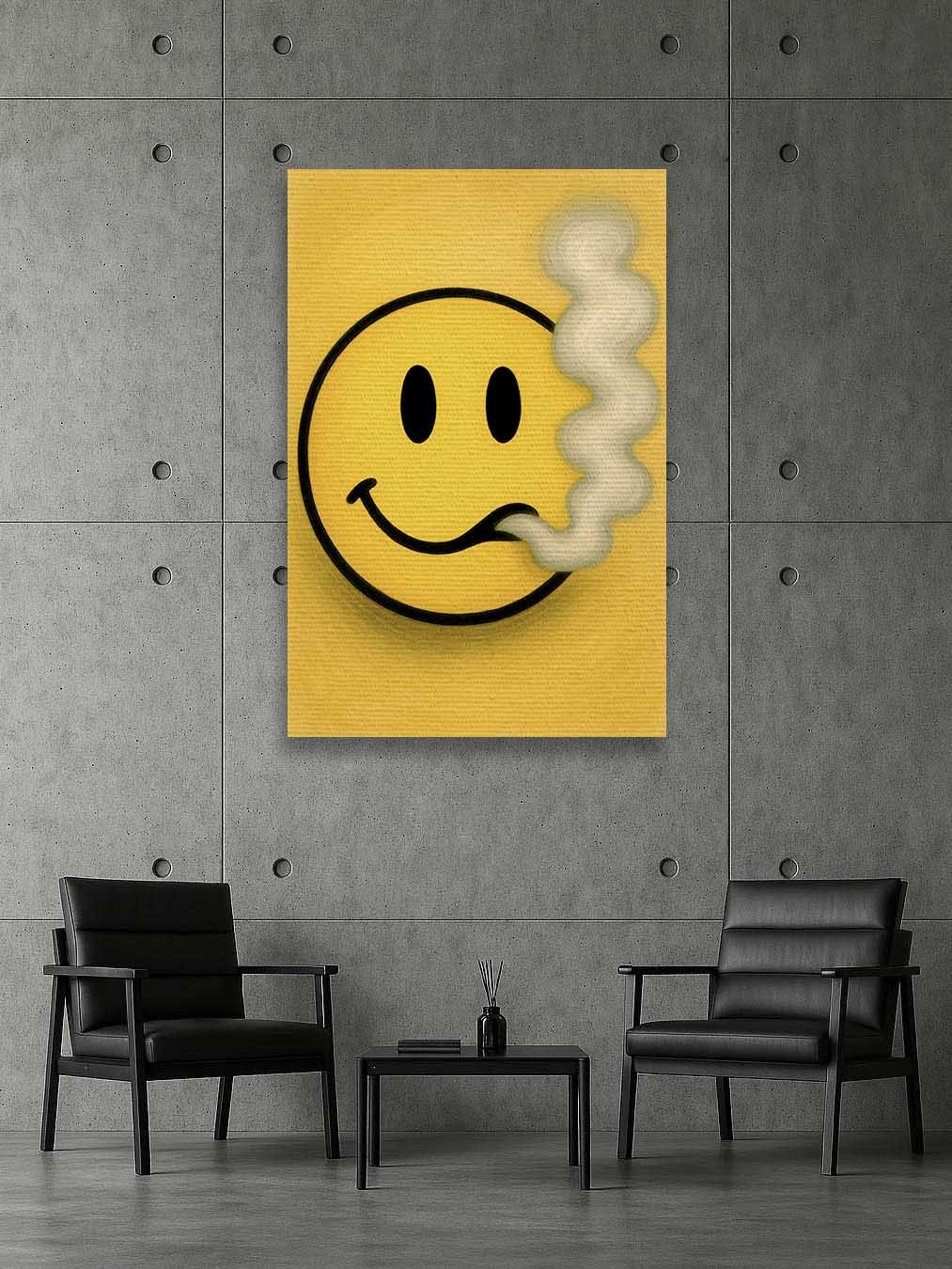 A yellow poster with a black smiley face wearing a cigarette on its mouth, with smoke coming out, is hung on a gray concrete wall. Two black armchairs and a small black table with a reed diffuser are in front of the poster.