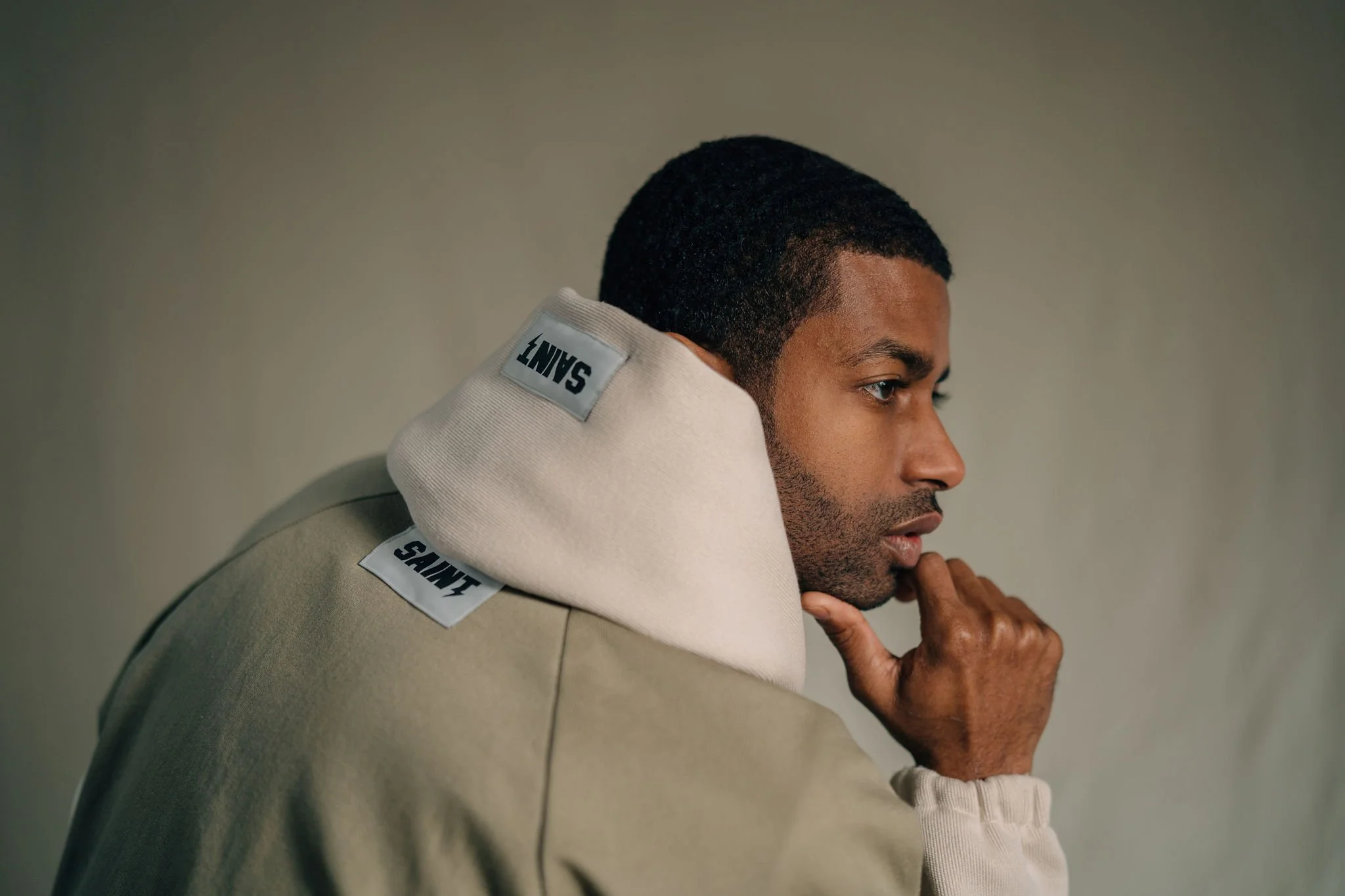 Patrick Sims modeling luxury streetwear in a fashion campaign for Saint Alexander.