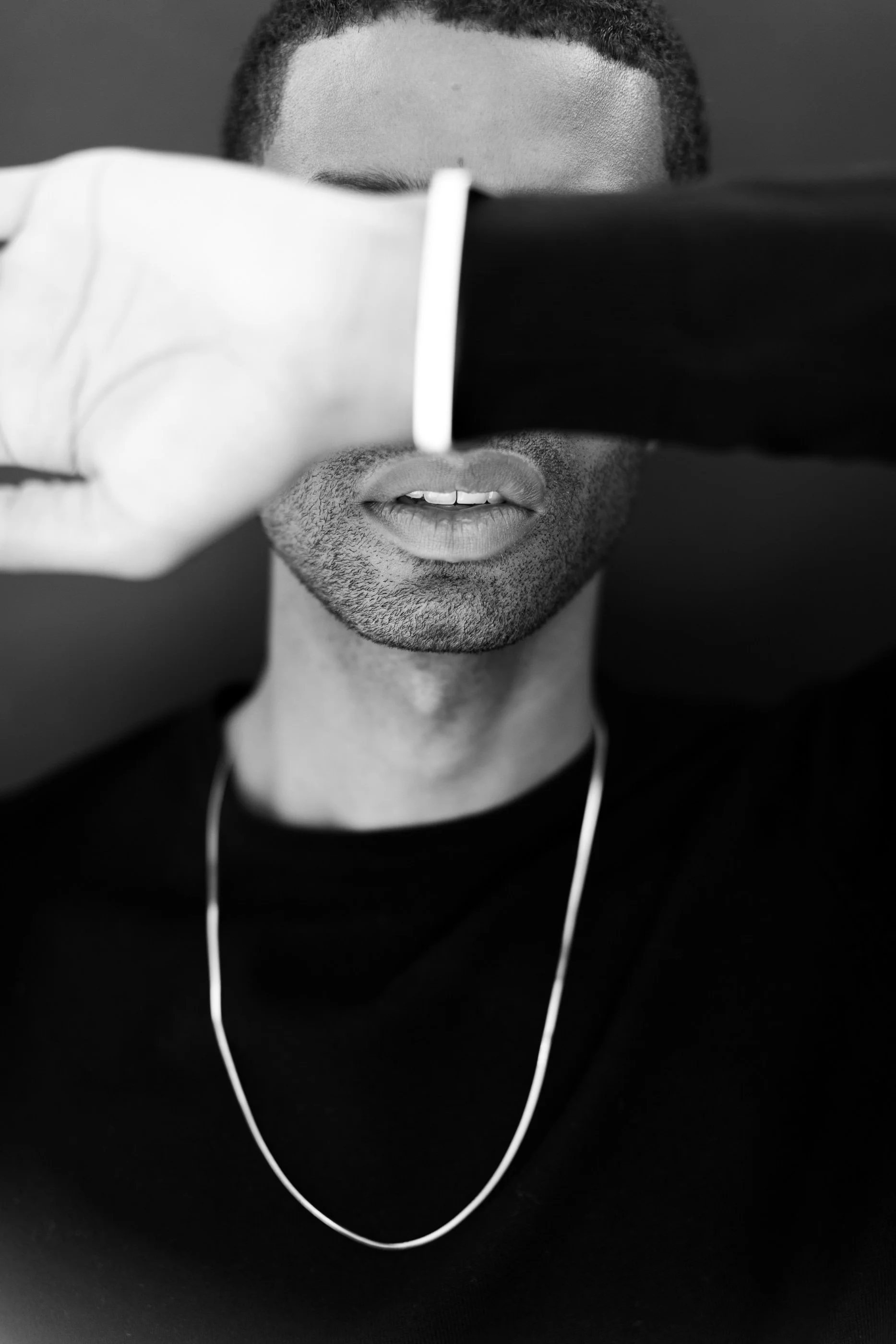 Patrick Sims modeling men's jewelry for Limbo Jewelry.