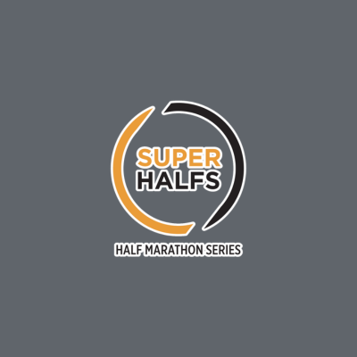 Logo for Super Halfs Half Marathon Series featuring half circle shapes in black and orange, with the text 'SUPER HALFS' in the center and 'HALF MARATHON SERIES' below.