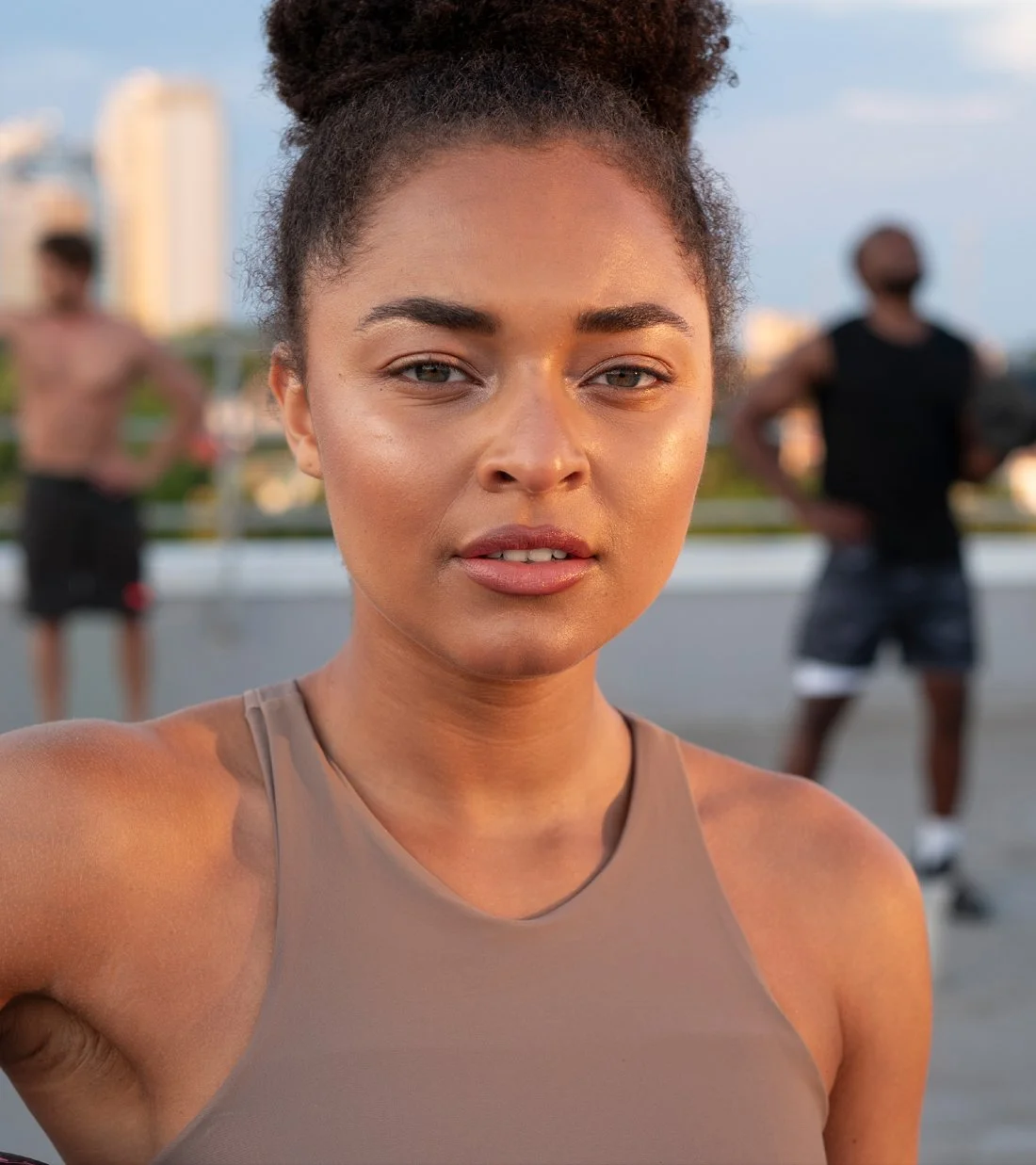 Athlete portrait captured outdoors, expressing confidence and calm focus while reinforcing the human side of the Relentless performance mindset.