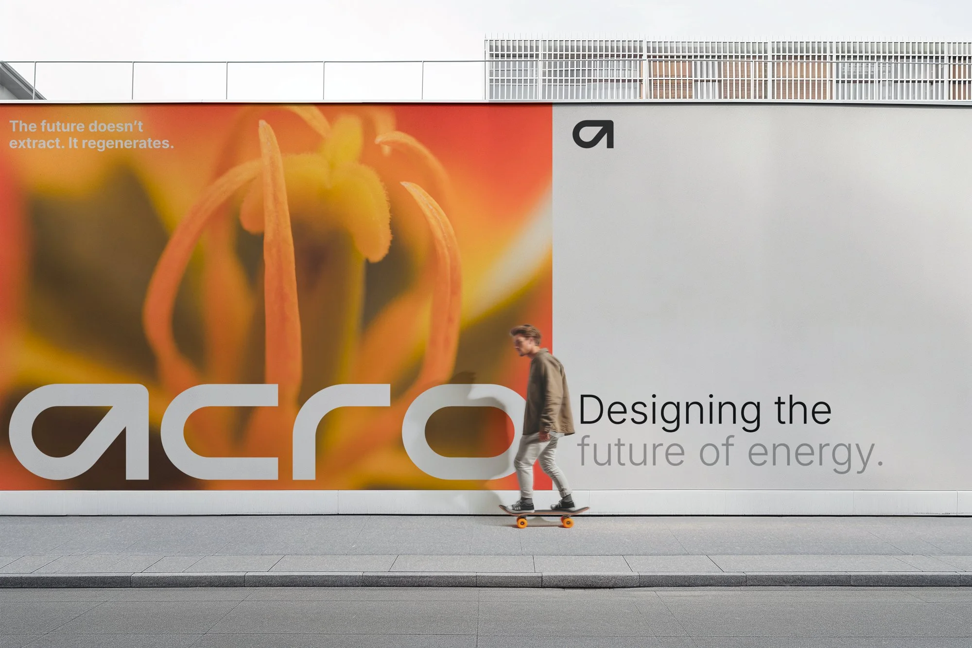 Large-scale outdoor brand application for Acro Energy showcasing the logo and campaign messaging, demonstrating how the identity system performs with clarity and confidence at architectural scale.