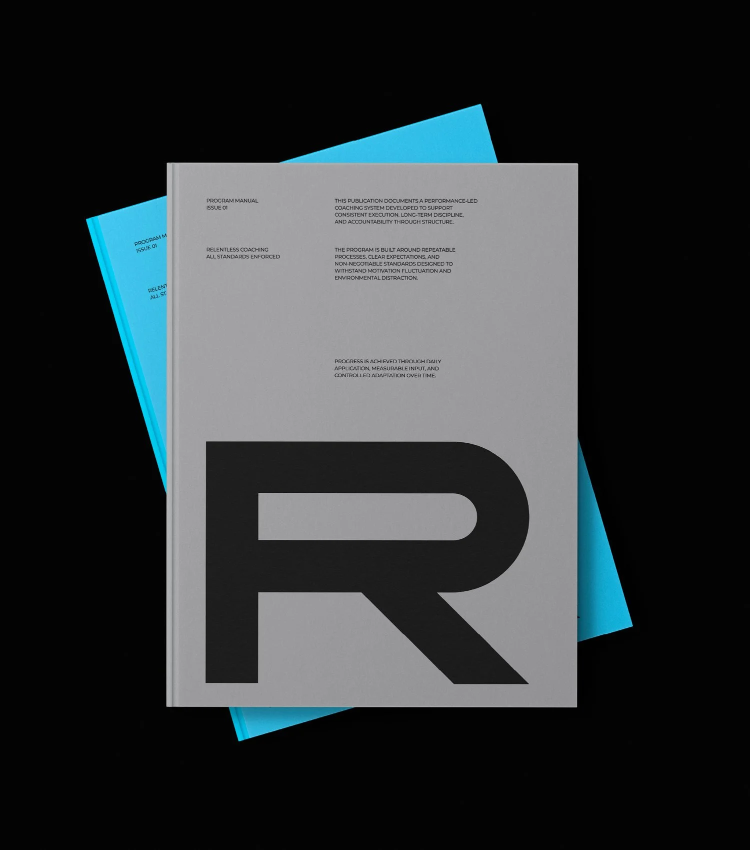 Relentless visual system combining a controlled monochrome palette with a focused blue accent used to signal movement, intent, and activation.