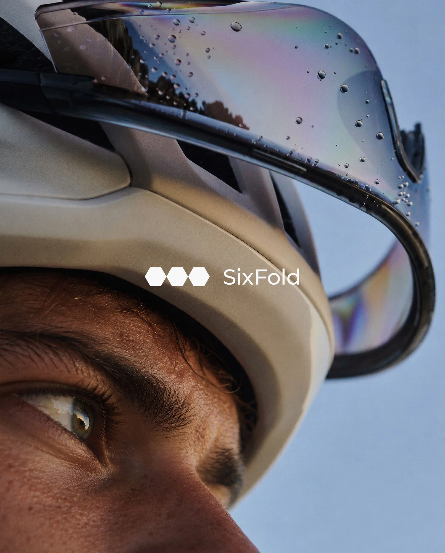 Sixfold visual identity featuring close-up cycling photography, minimalist white typography and athletic imagery, showcasing contemporary sports branding and creative direction.