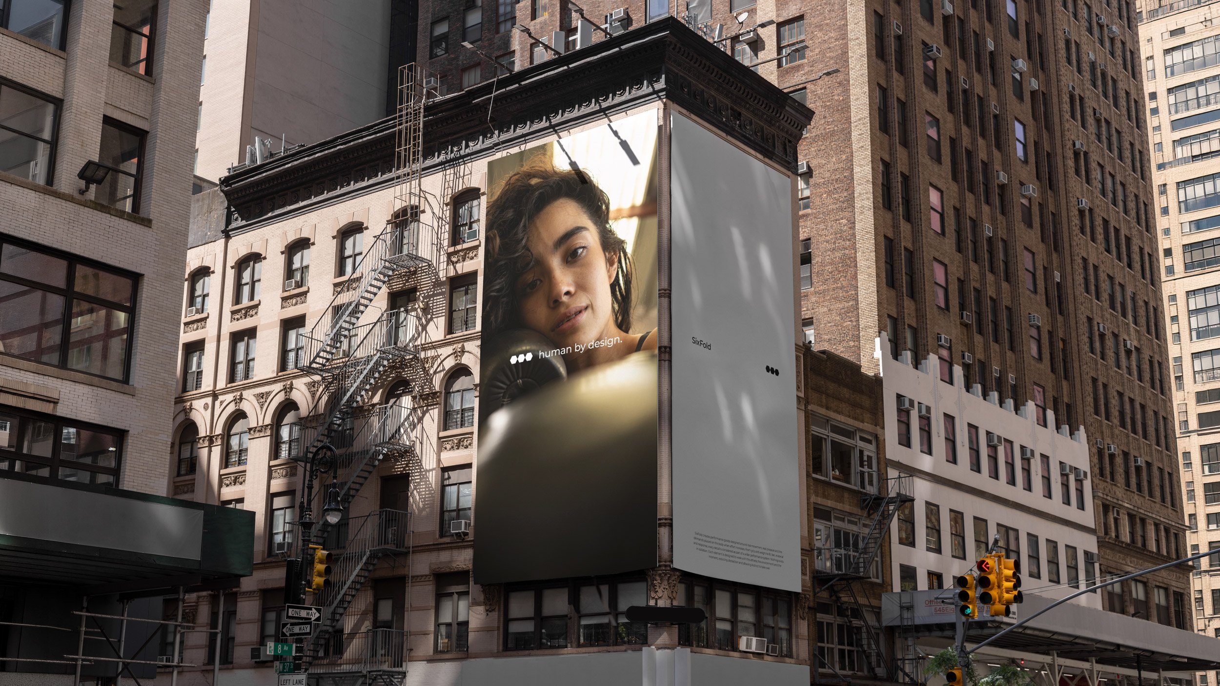 Sixfold brand identity showcased through a large-scale digital billboard featuring portrait photography in an urban environment.