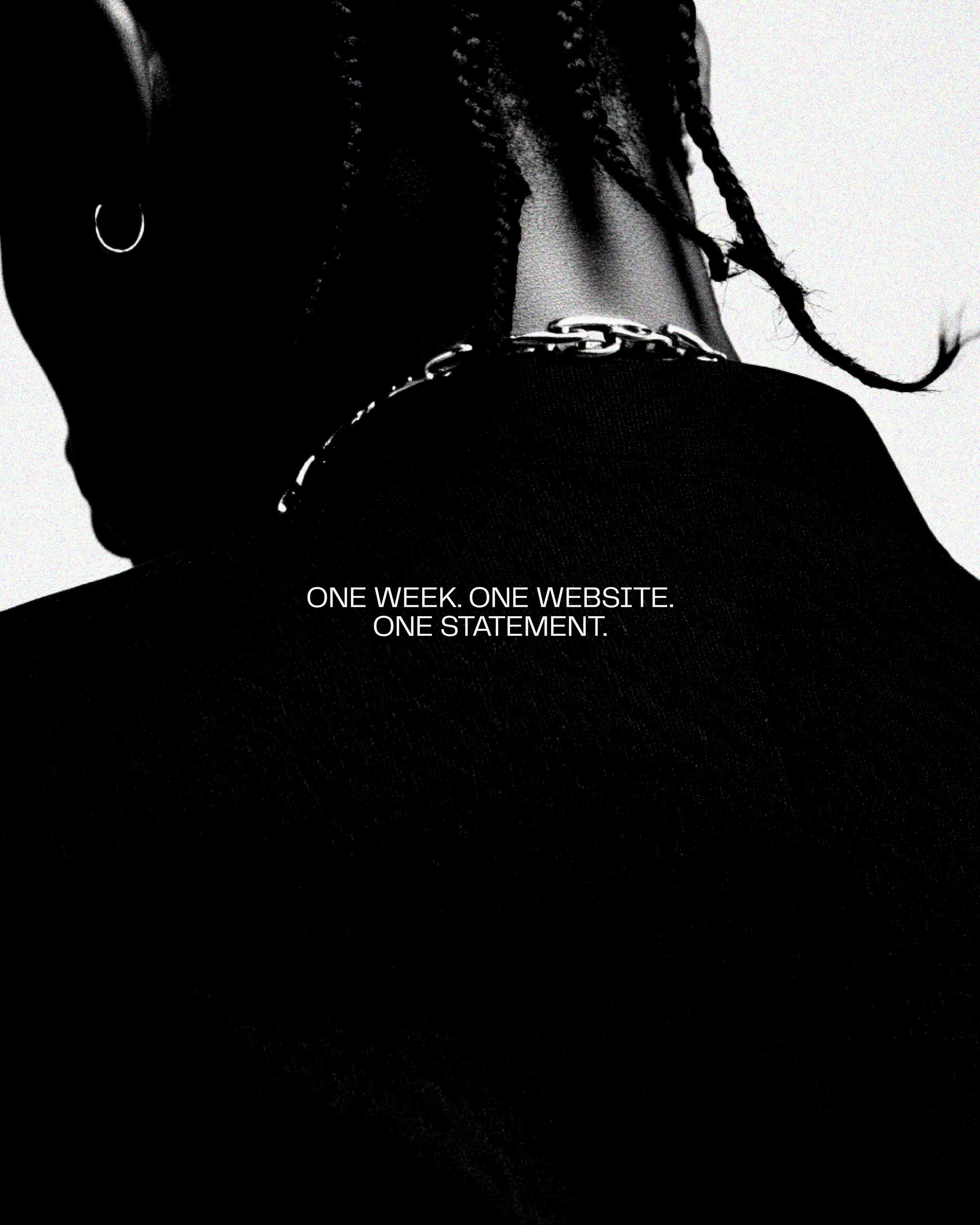 A black and white photograph of a person with braided hair, wearing a chain necklace and earrings, with a text overlay that says 'One week. One website. One statement.'