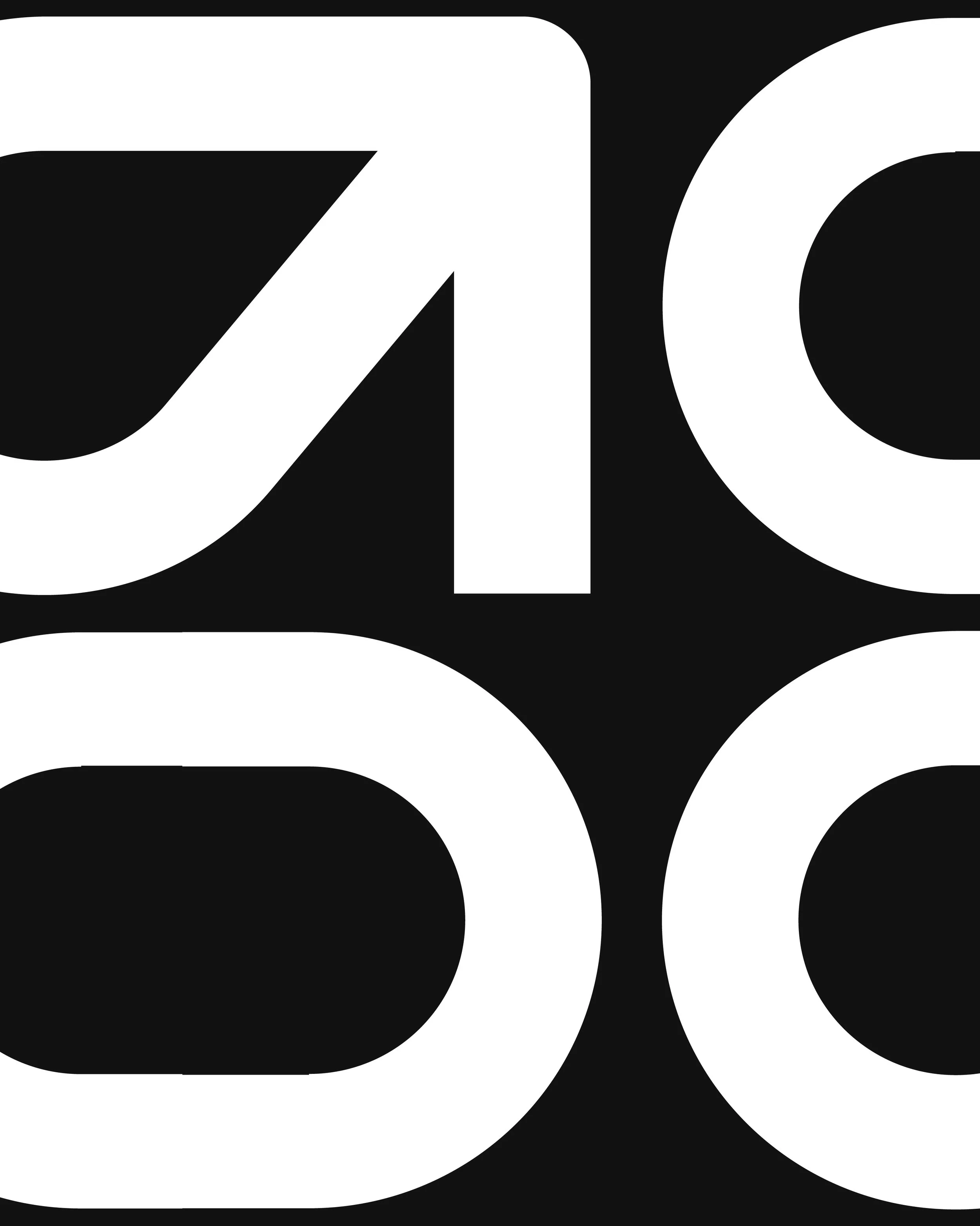 Close-up of black and white graphic text with large, bold, overlapping letters and numbers.