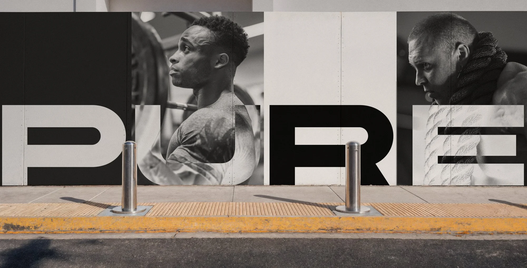 Large-format outdoor brand installation for Pure Strength featuring athlete photography and oversized typography, demonstrating how the identity system performs at architectural scale.