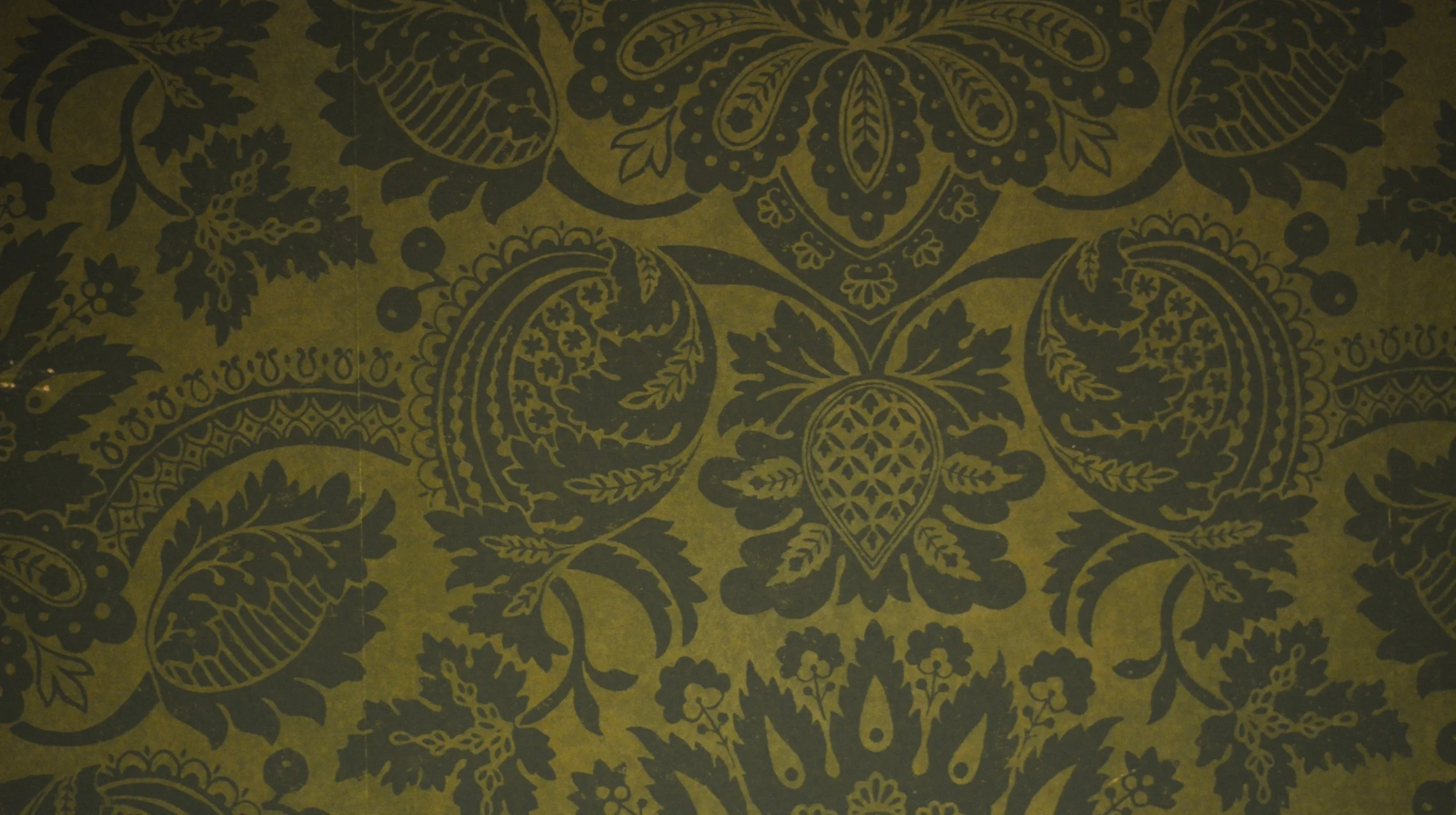 Earthy olive and charcoal botanical wallpaper pattern