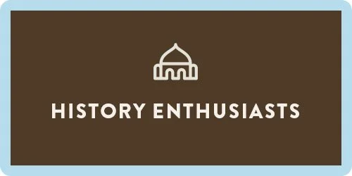 Brown background with a white outline of a dome-shaped building and the text 'HISTORY ENTHUSIASTS' in white capital letters.