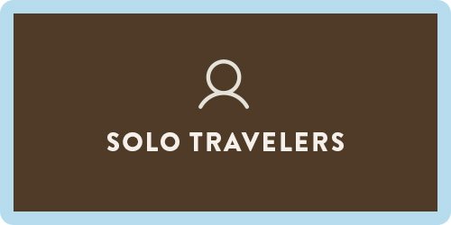 Icon of a person above the text 'Solo Travelers' on a brown background.