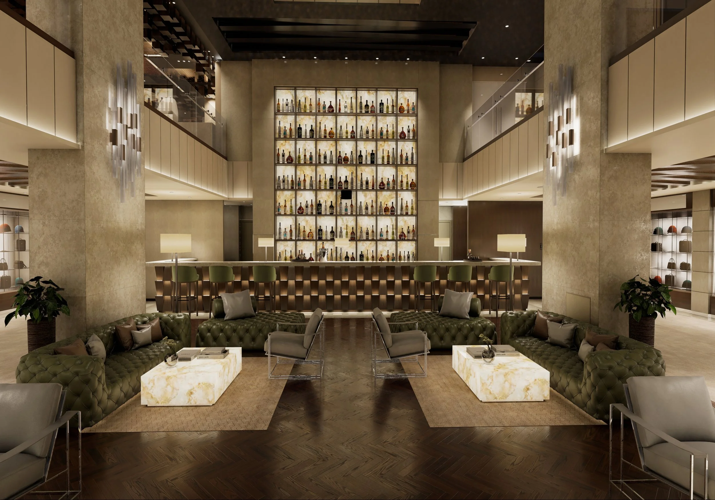 Interior of a modern hotel lobby with a large illuminated display of bottles of alcohol, comfortable seating, marble tables, and ambient lighting.