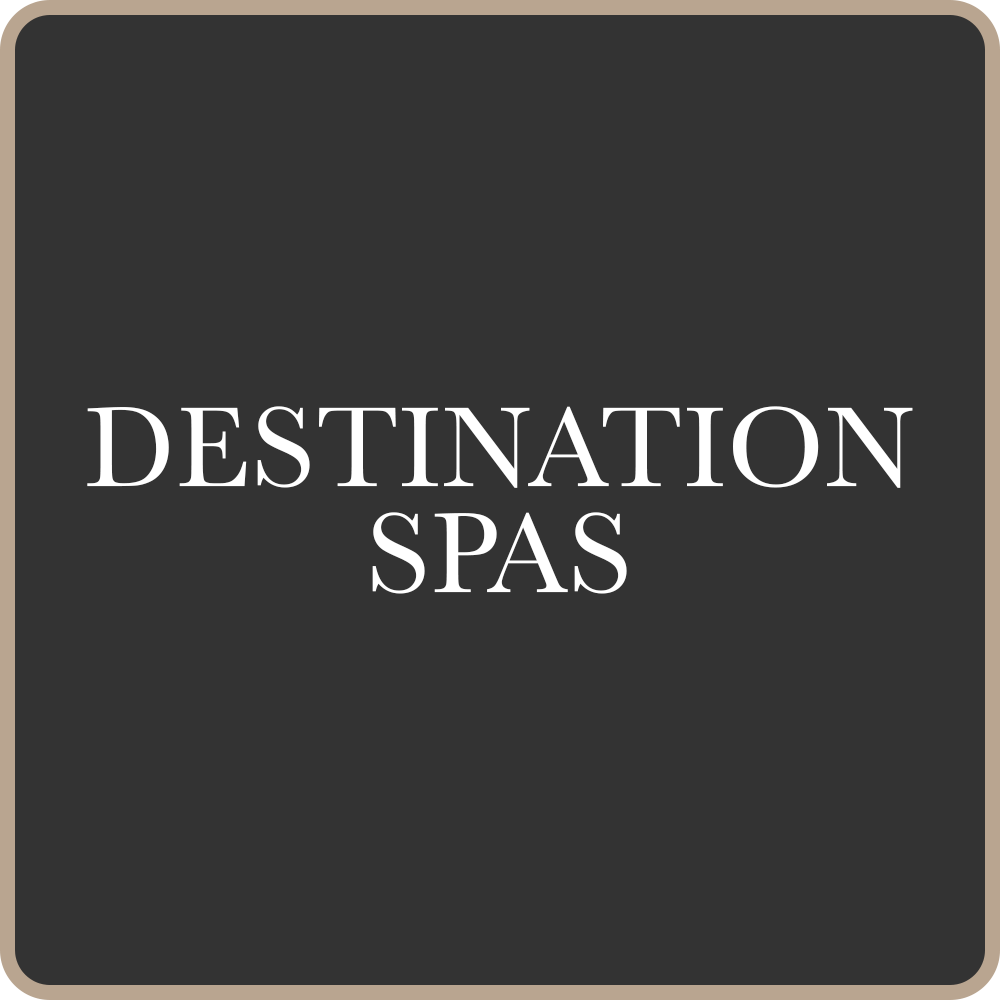 A digital screen with the words 'Destination Spas' on a dark background.